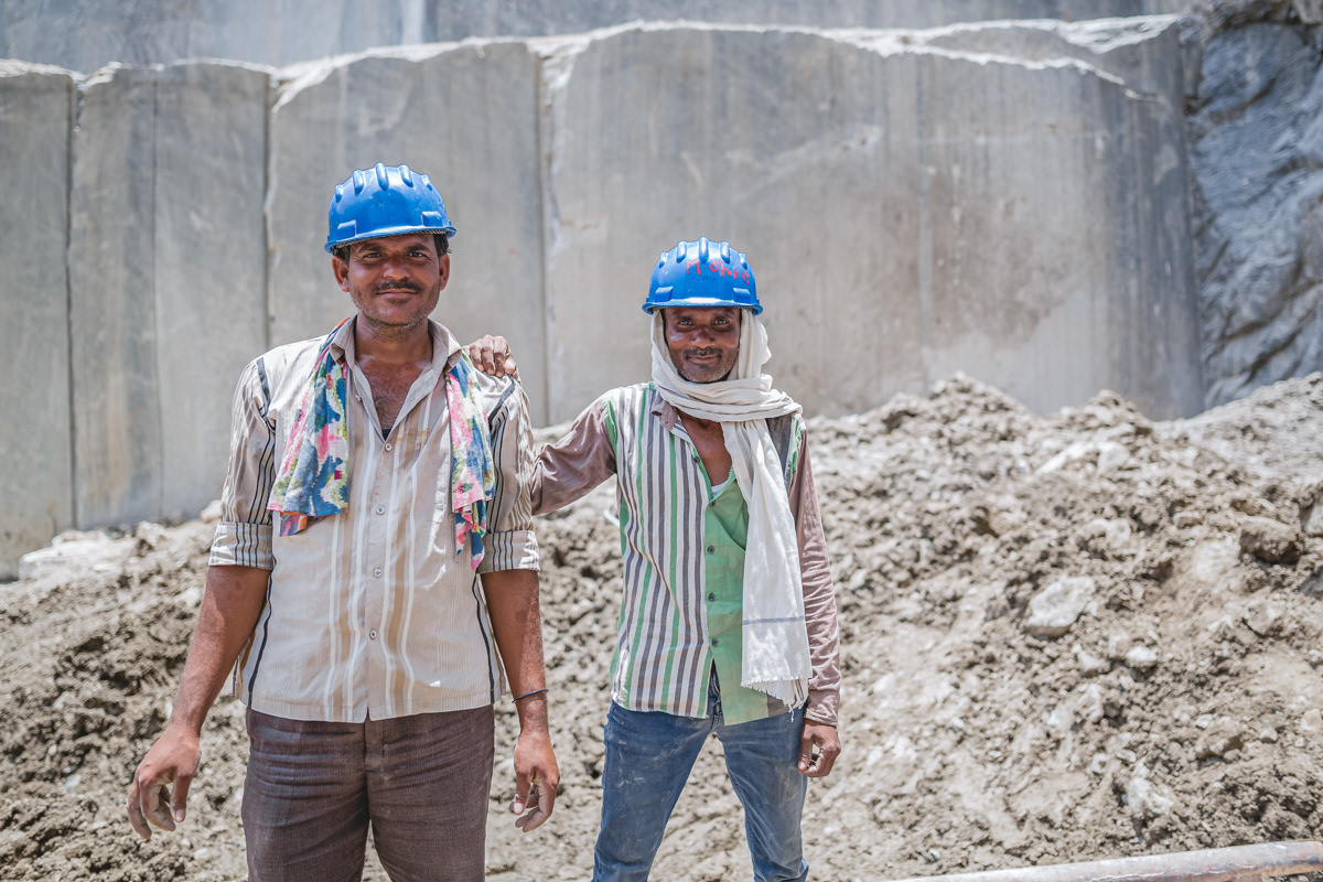 Portrait of two miners working at a quarry
