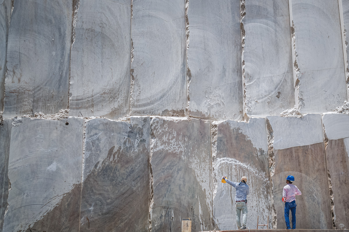 Water splashed on quarry stone wall to check for patterns