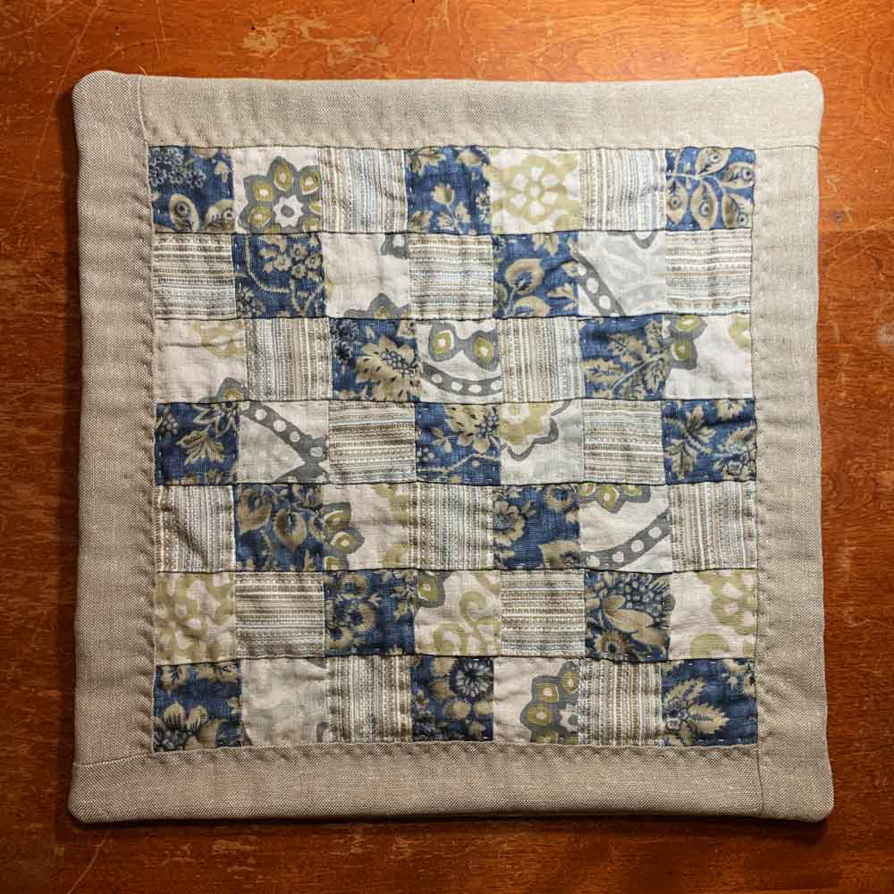 Scrappy Taupe Pillow Cover Front