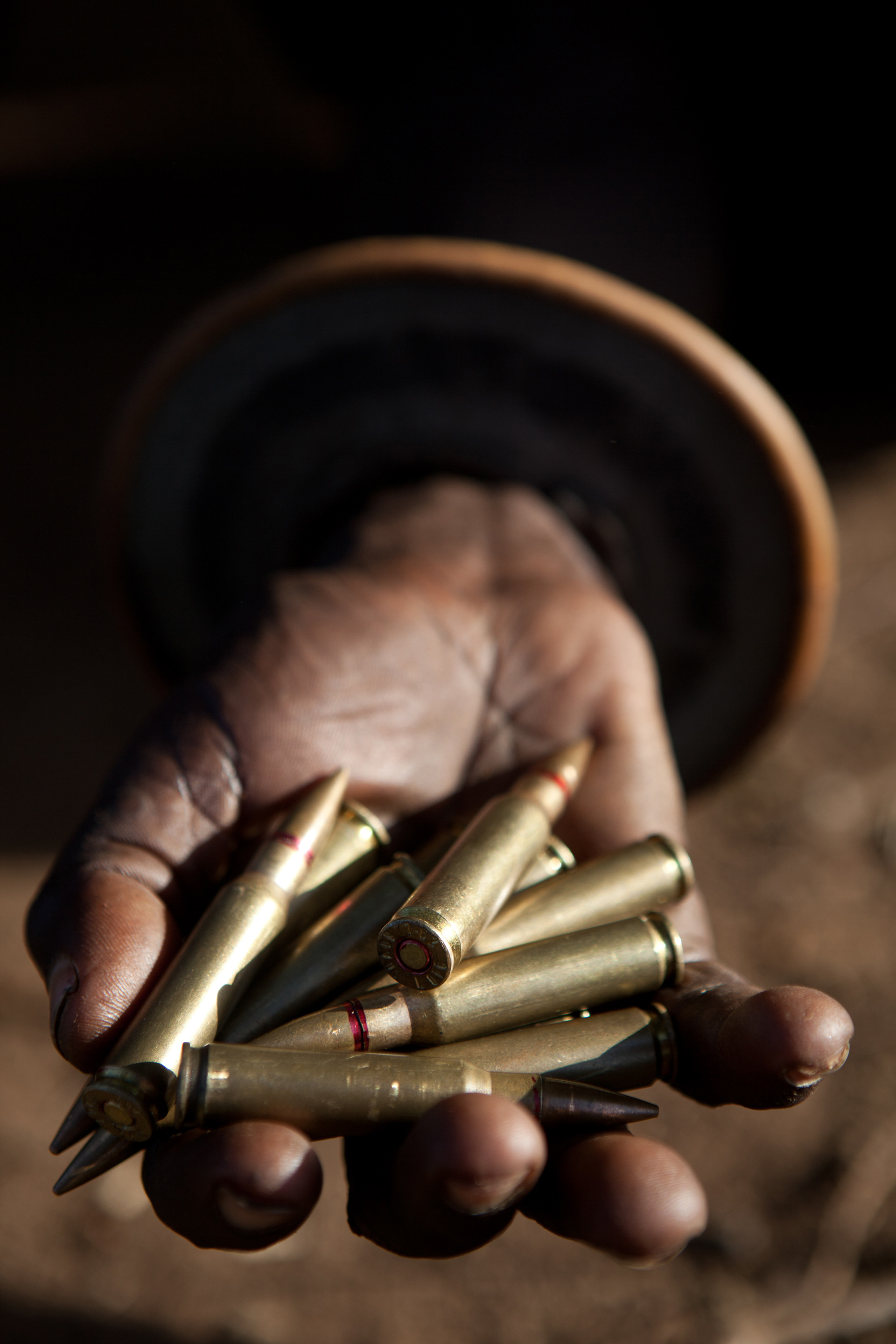 A Turkana tribe man, member of the Kenyan police reserve, shows G3 ammunitions provided by the government.