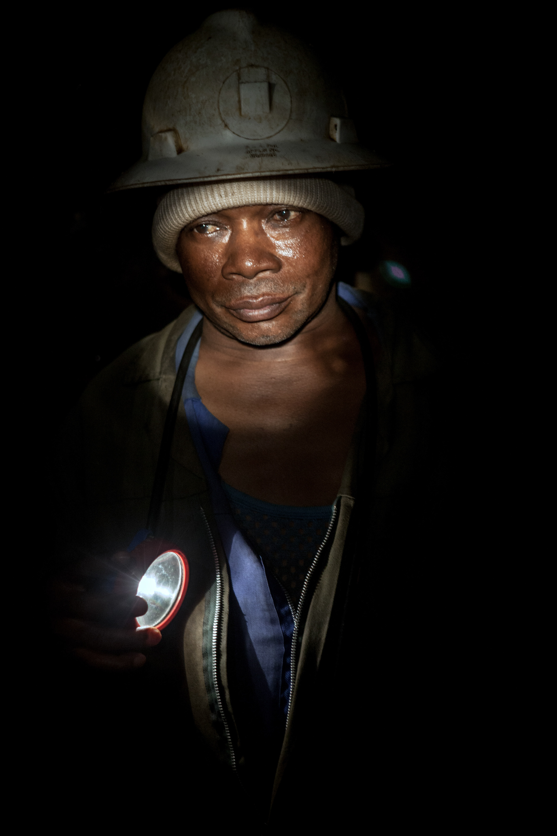 An employee of the Gecamines in Kipushi : in 2003, in this site, only 300 employees of an initial staff of 2500, kept their jobs. The monthly salary of a miner is about $200 US and payments have a delay of 45 months...