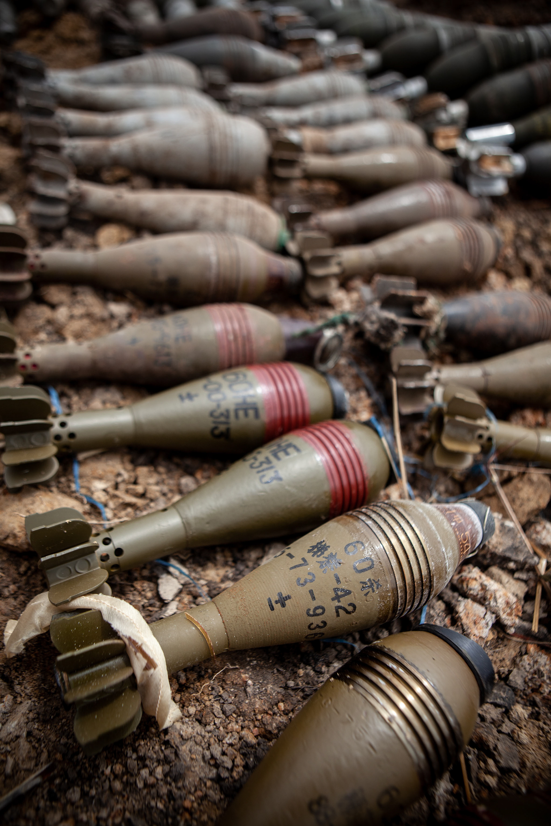 Imported from China, from the United States, from Belgium and from Ex-Yougoslavie, hundreds of mortars "sleep" today in the heart of a residential area of Lubumbashi. The years of conflict that ravaged the Democratic Republic of Congo have resulted in the presence of large numbers of weapons and ammunition from all over the world.