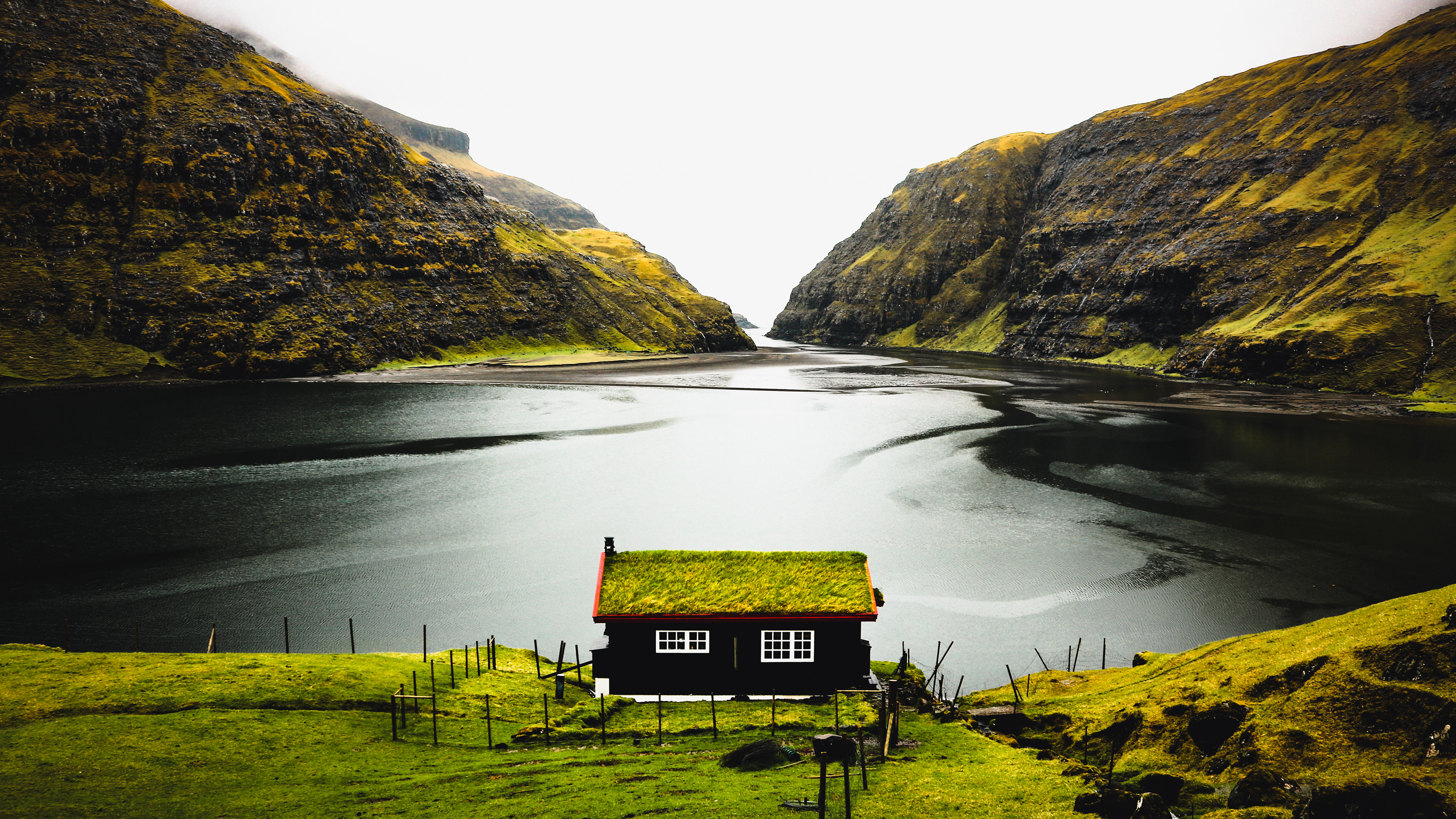 Faroe Islands, Saksun. Cabin with a view in this remote 14 inhabitants village.