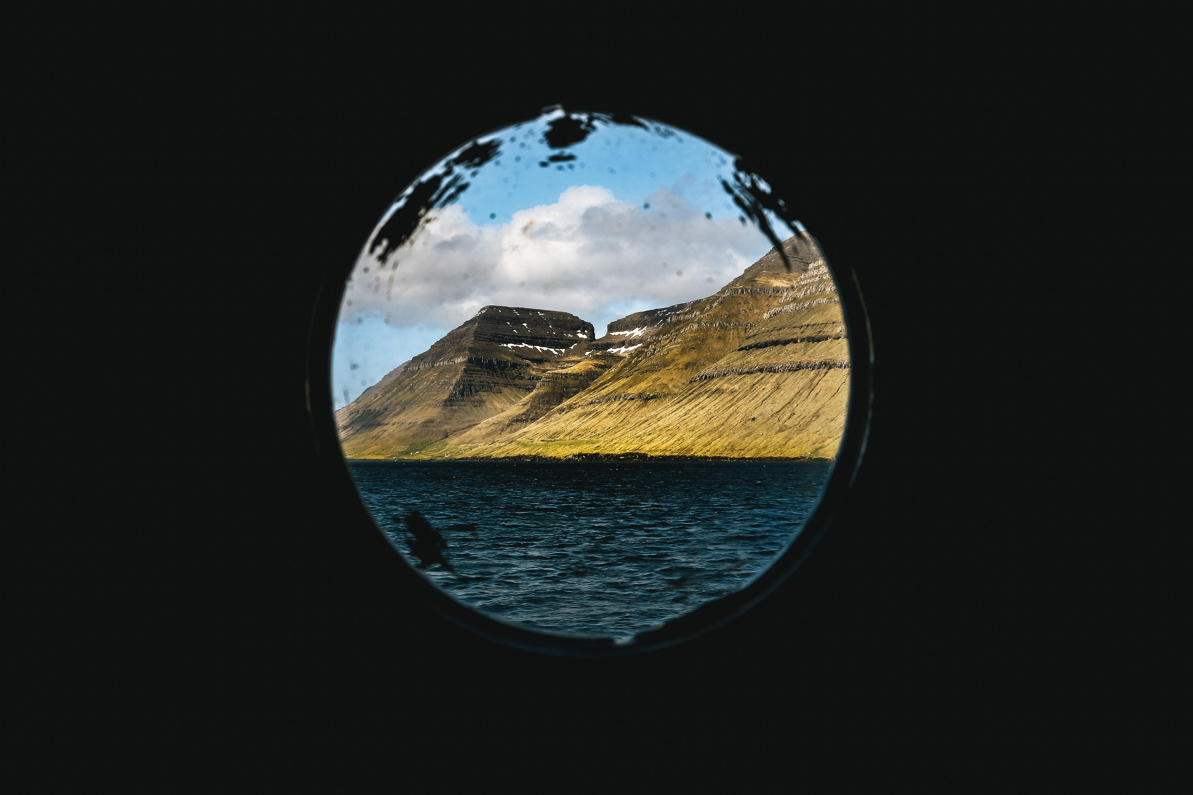 Faroe Islands, Kalsoy. Quiet ferry crossing between Kunoy and Kalsoy islands.