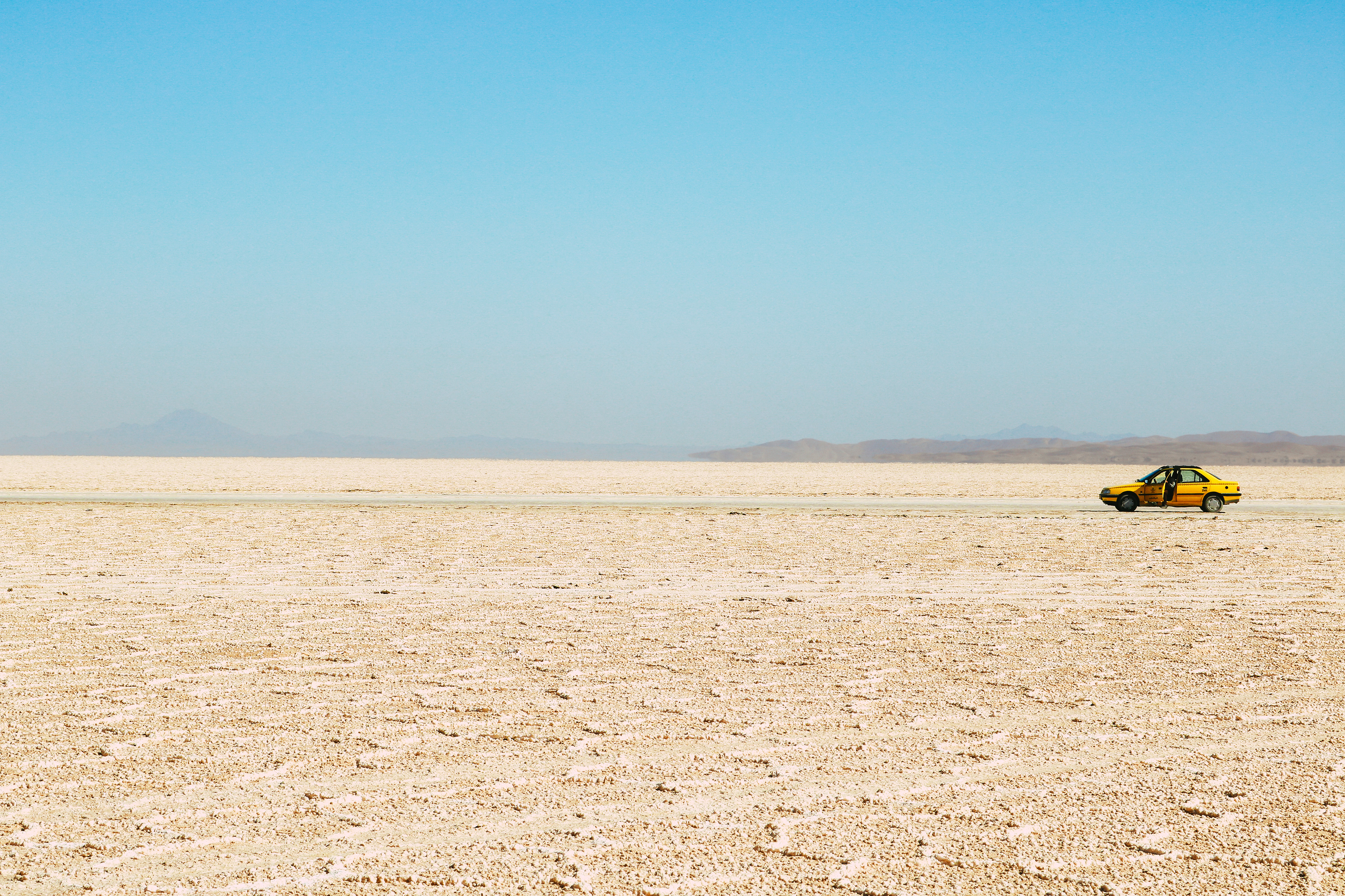 Iran, Kavir National Park. Taxi ride in the middle of the desert.