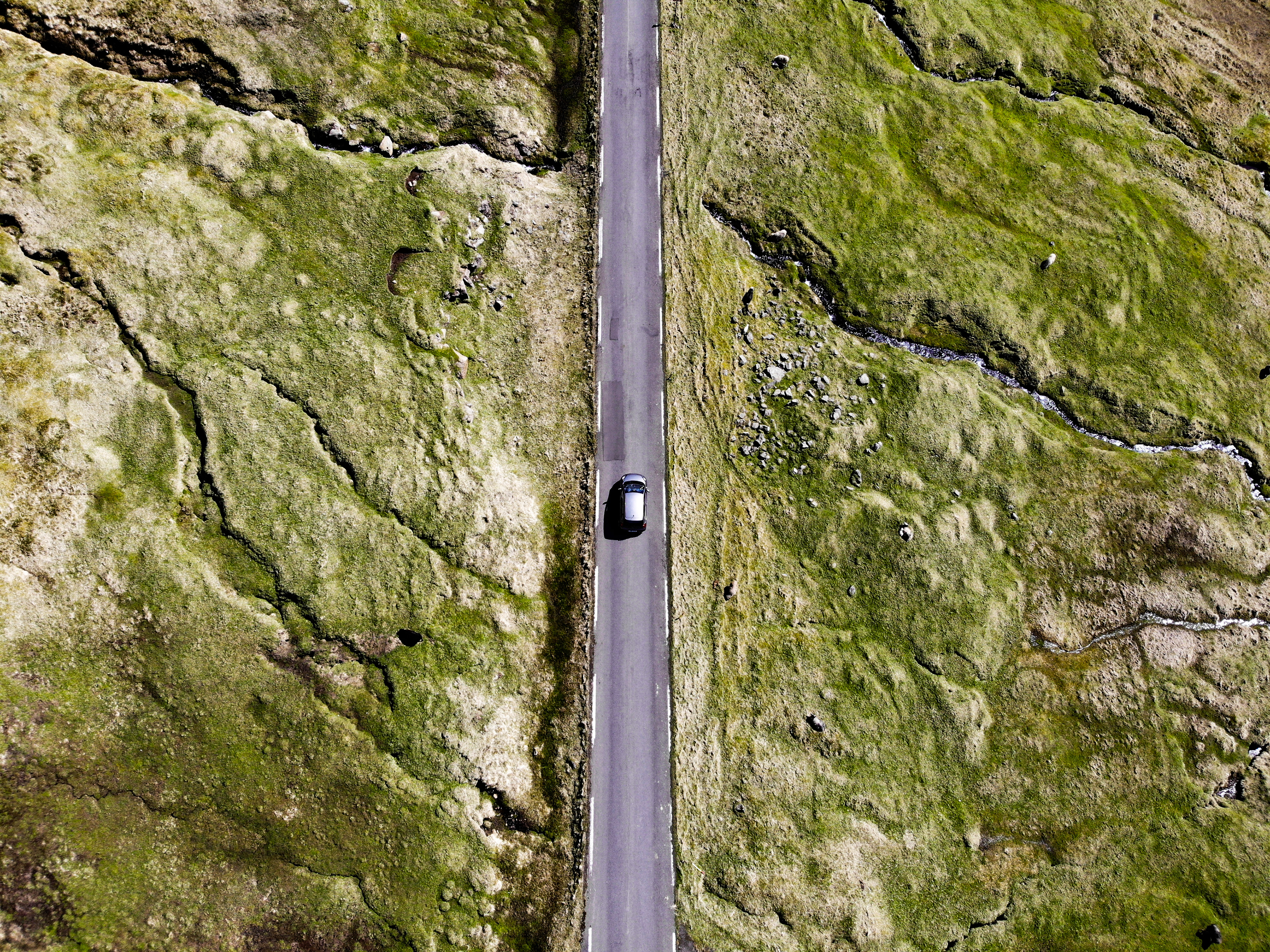 Faroe Islands, Eysturoy. Lonely ride within the fjords.
