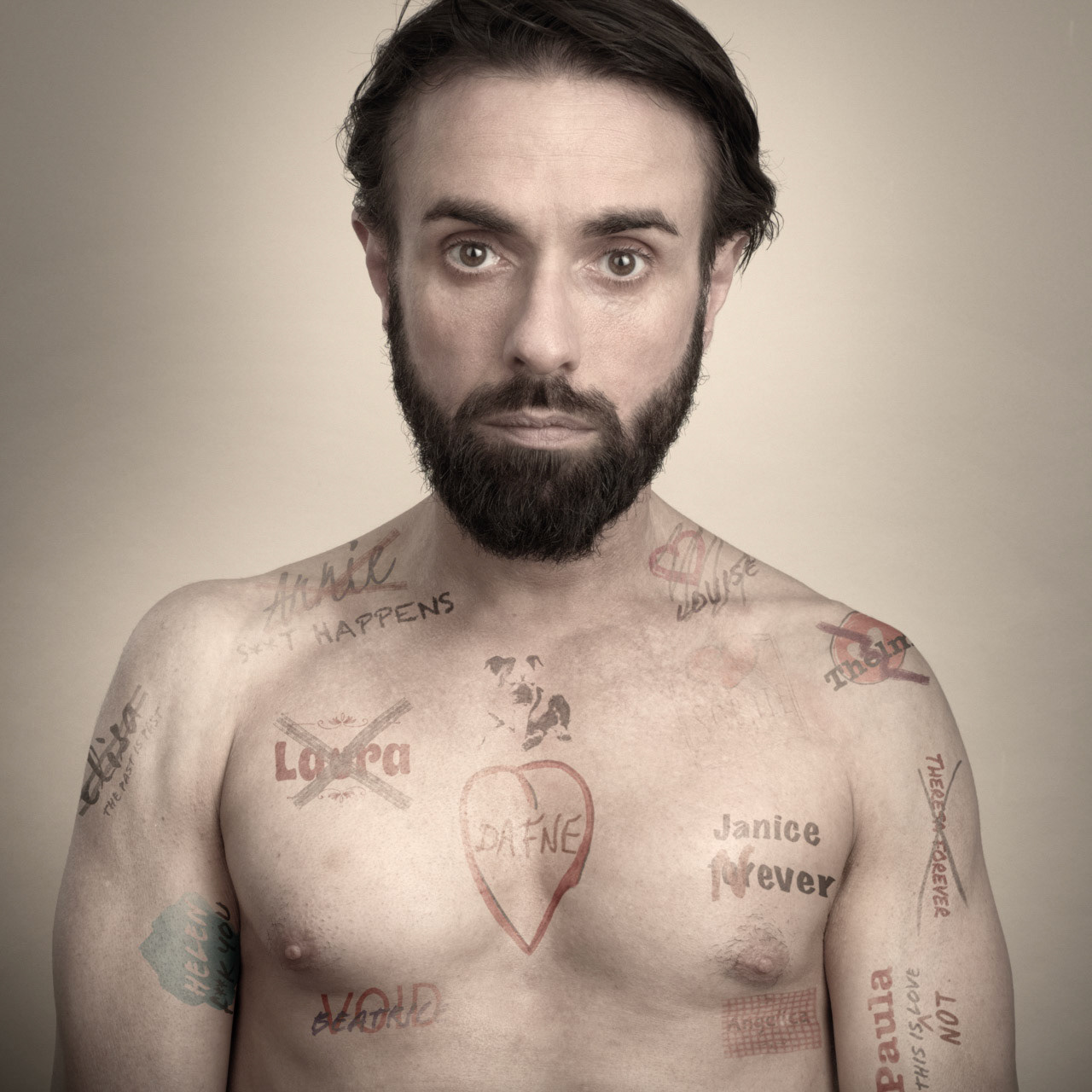 After many women this man now loves just his dog. This dog lover had manybreakups with women, all documented in his tattoos, to finally settle with a dog, Fido