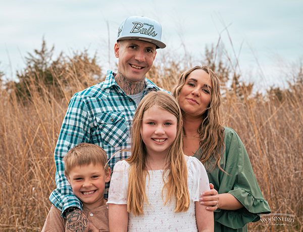 Family portrait in a field