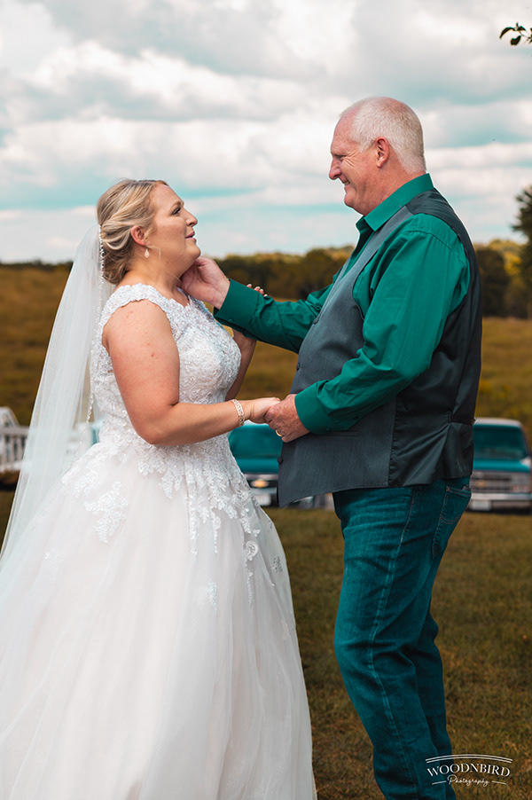 Bride and man in green shirt