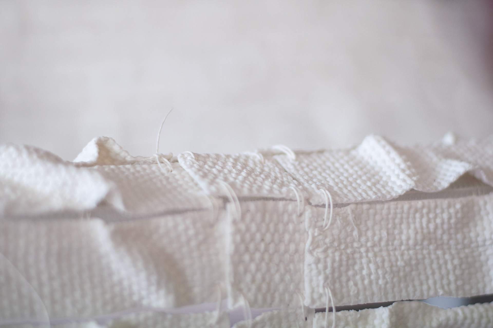 A cotton binding thread coated with wax yields strength which withstands the pressure and the test of time.