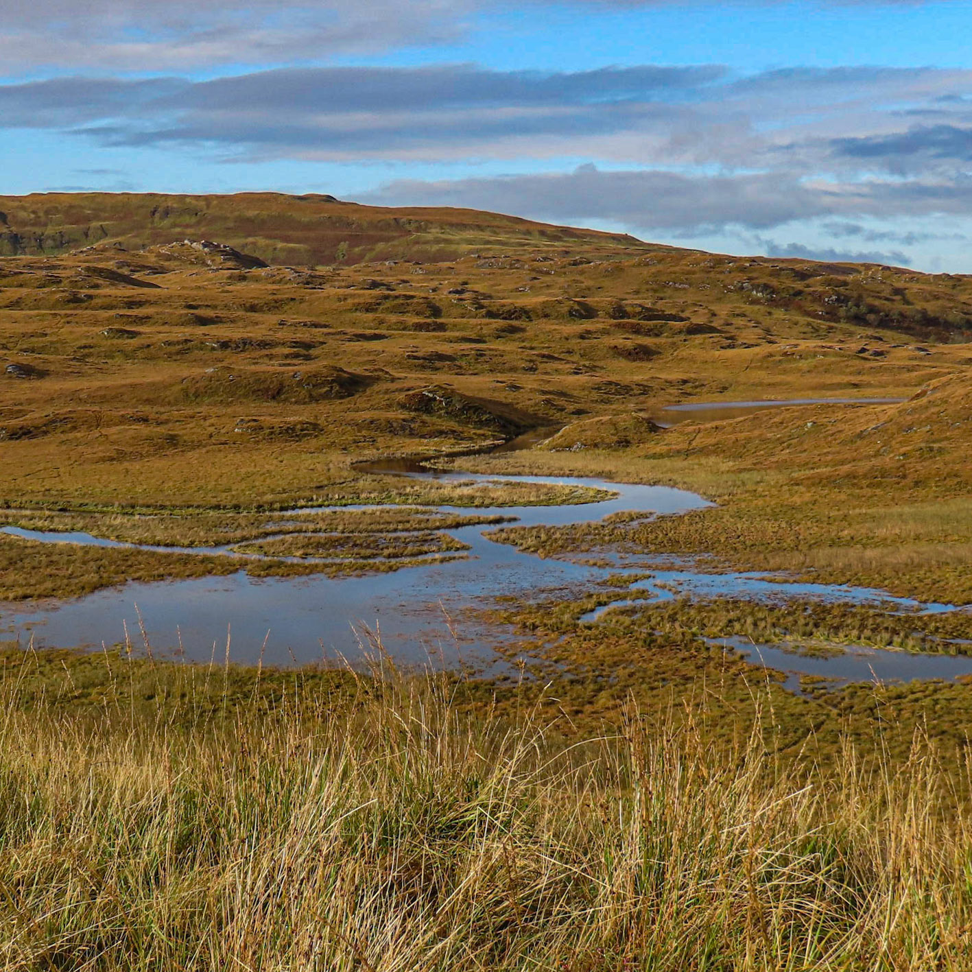 The meandering Rannoch River down to Lochan Lub an Arbhair (manmade loch) in the Rannoch Valley, Ardtornish Estate