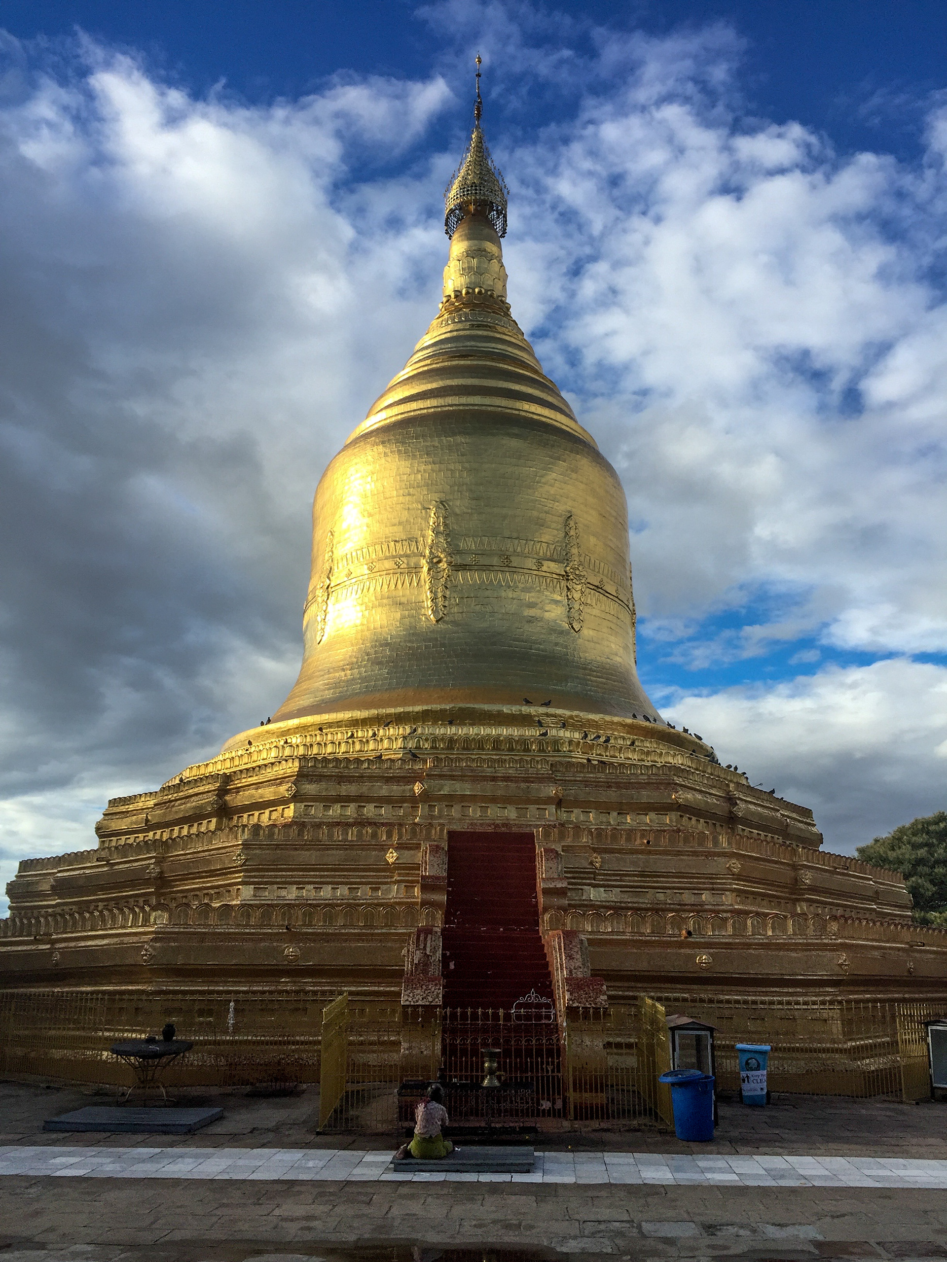 Woman praying at Lawkananda in Bagan, Myanmar