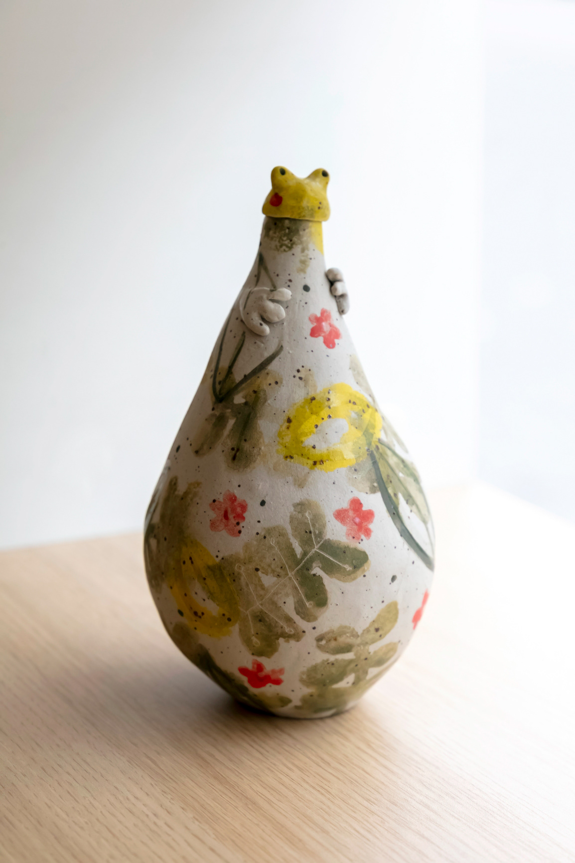 Bouteille grenouille en grès - 65€