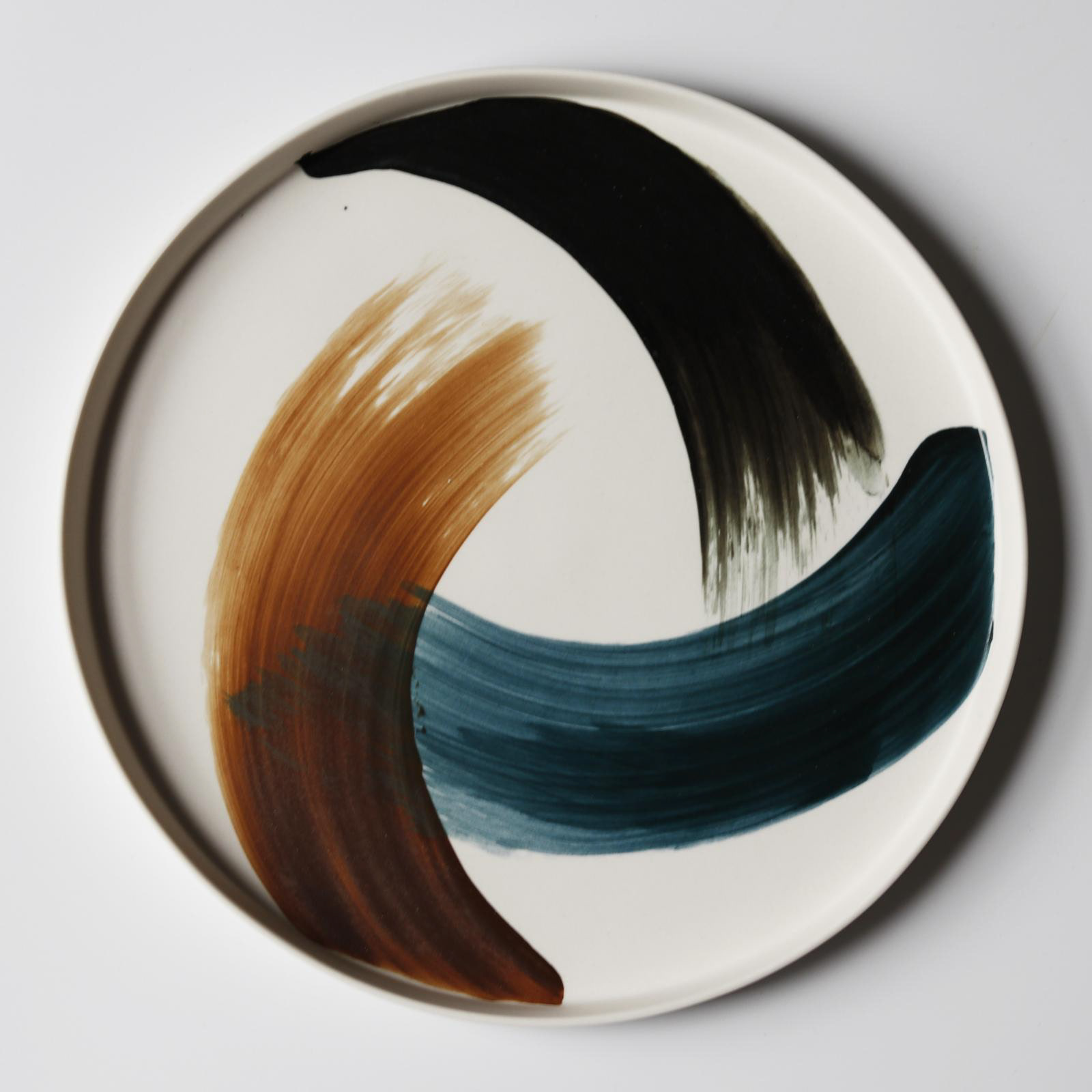 Plat rond en porcelaine - 70€