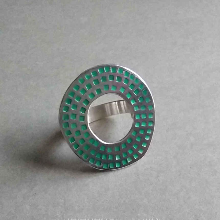 Bague "Roue Délos" en argent - 90 €