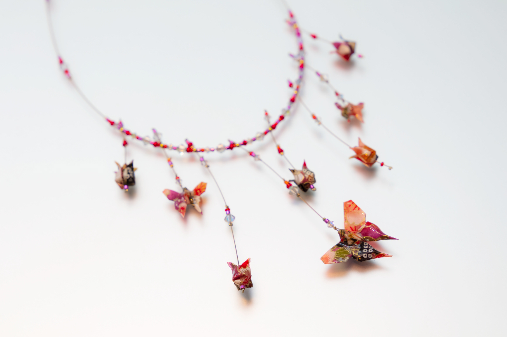 Collier papillons en origami - 95€