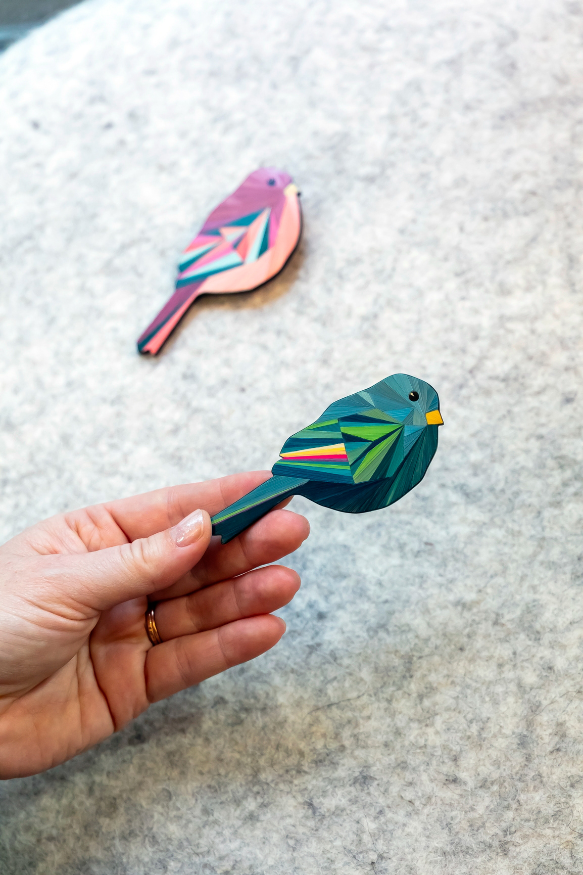 Broche Pan en marqueterie de paille -295€