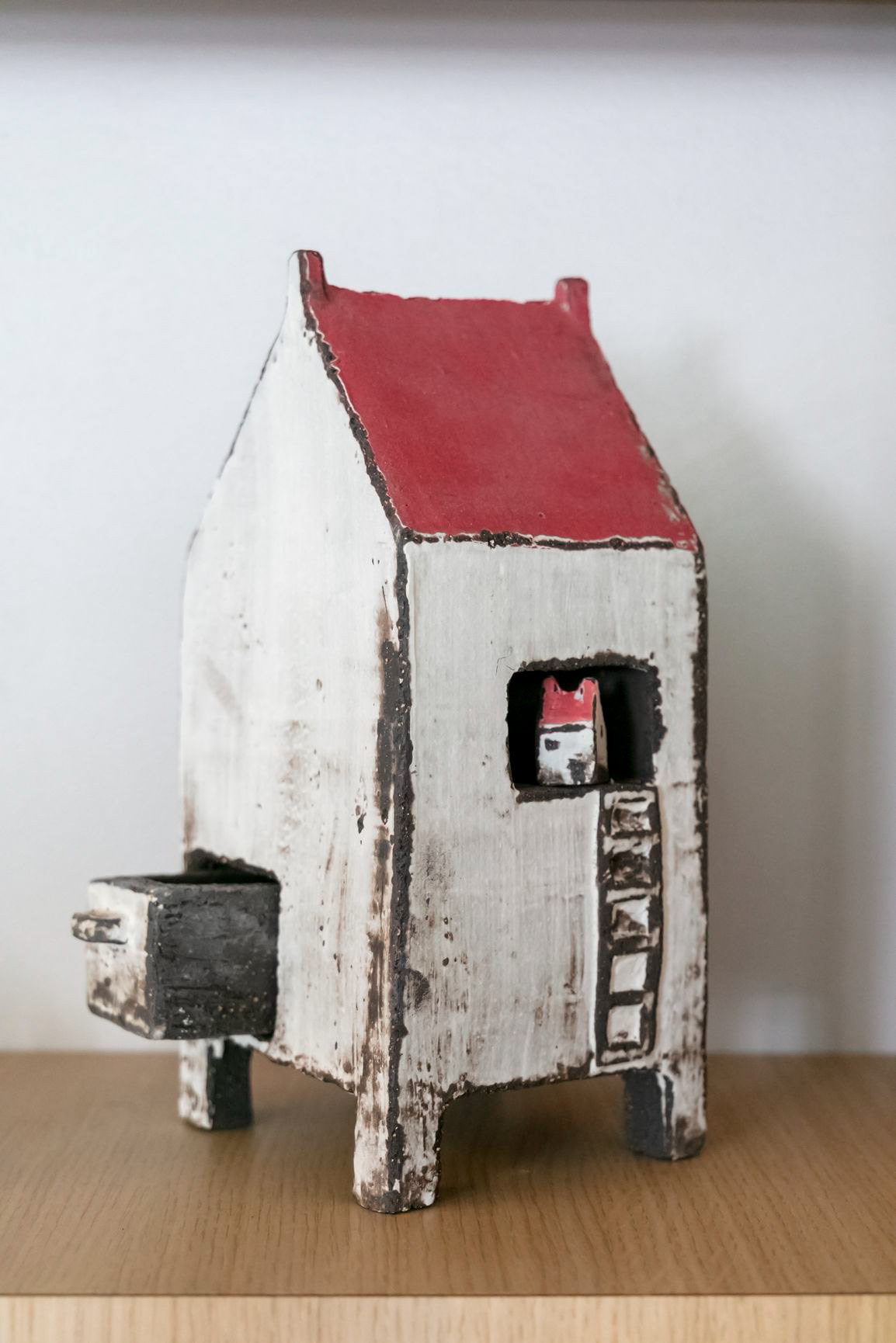 Maison sur roue avec tiroir en grès - 210€