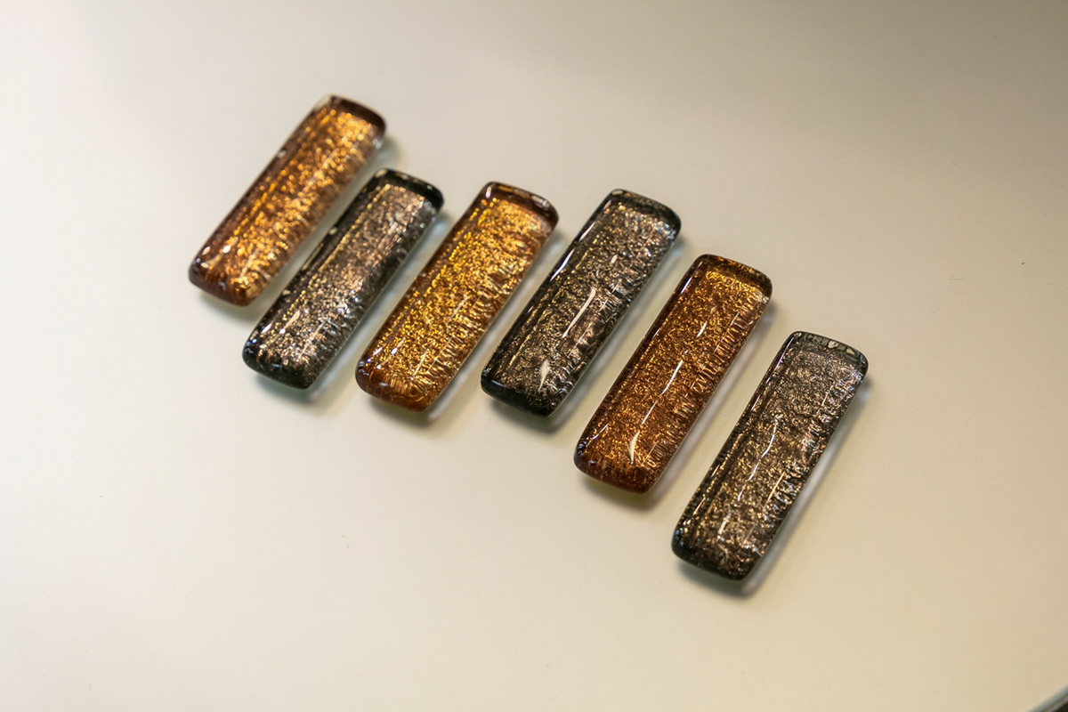 Lot de 12 porte-couteaux dorés et argentés - 128€