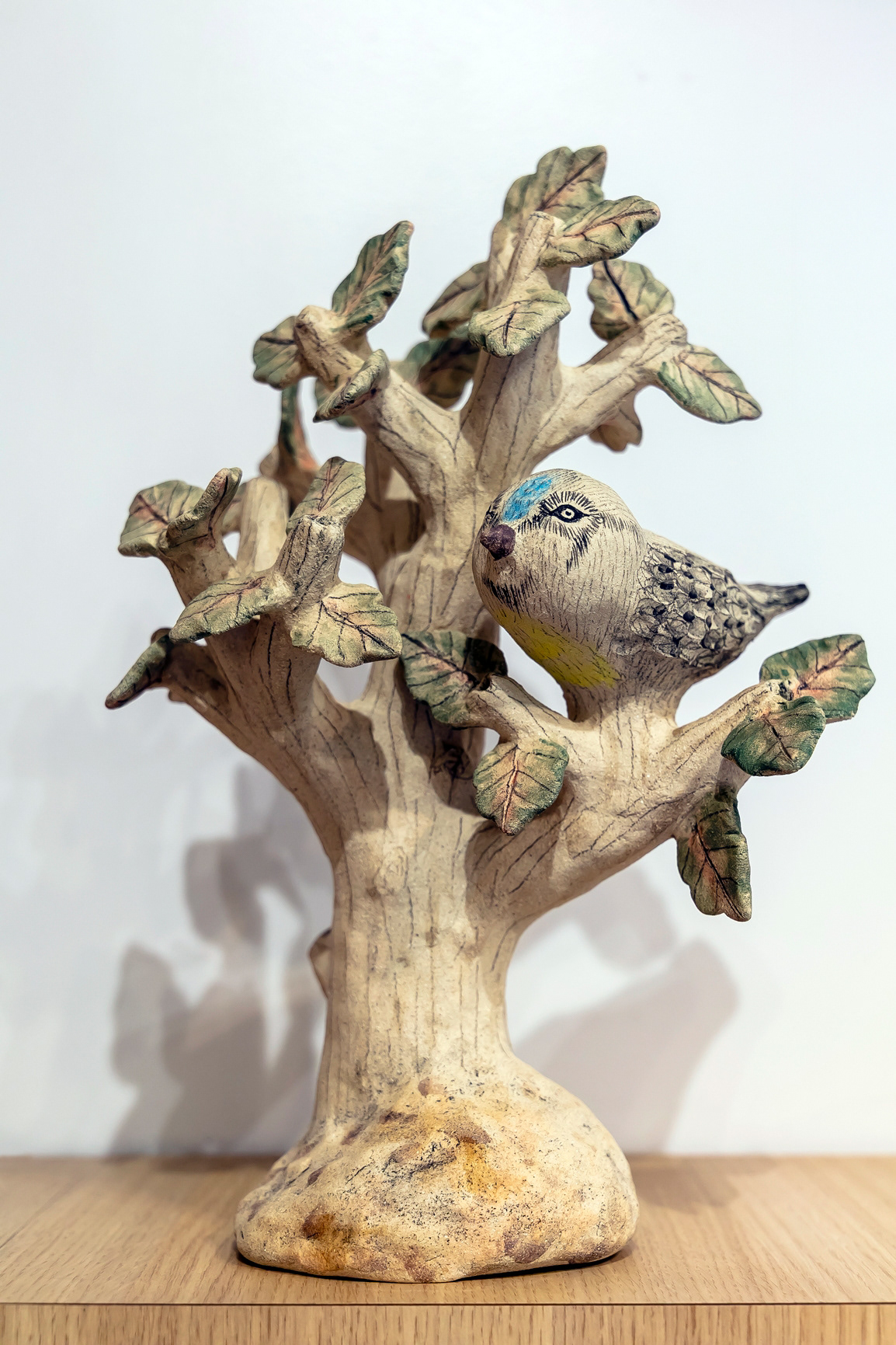 Arbre avec oiseau en grès - 1200€