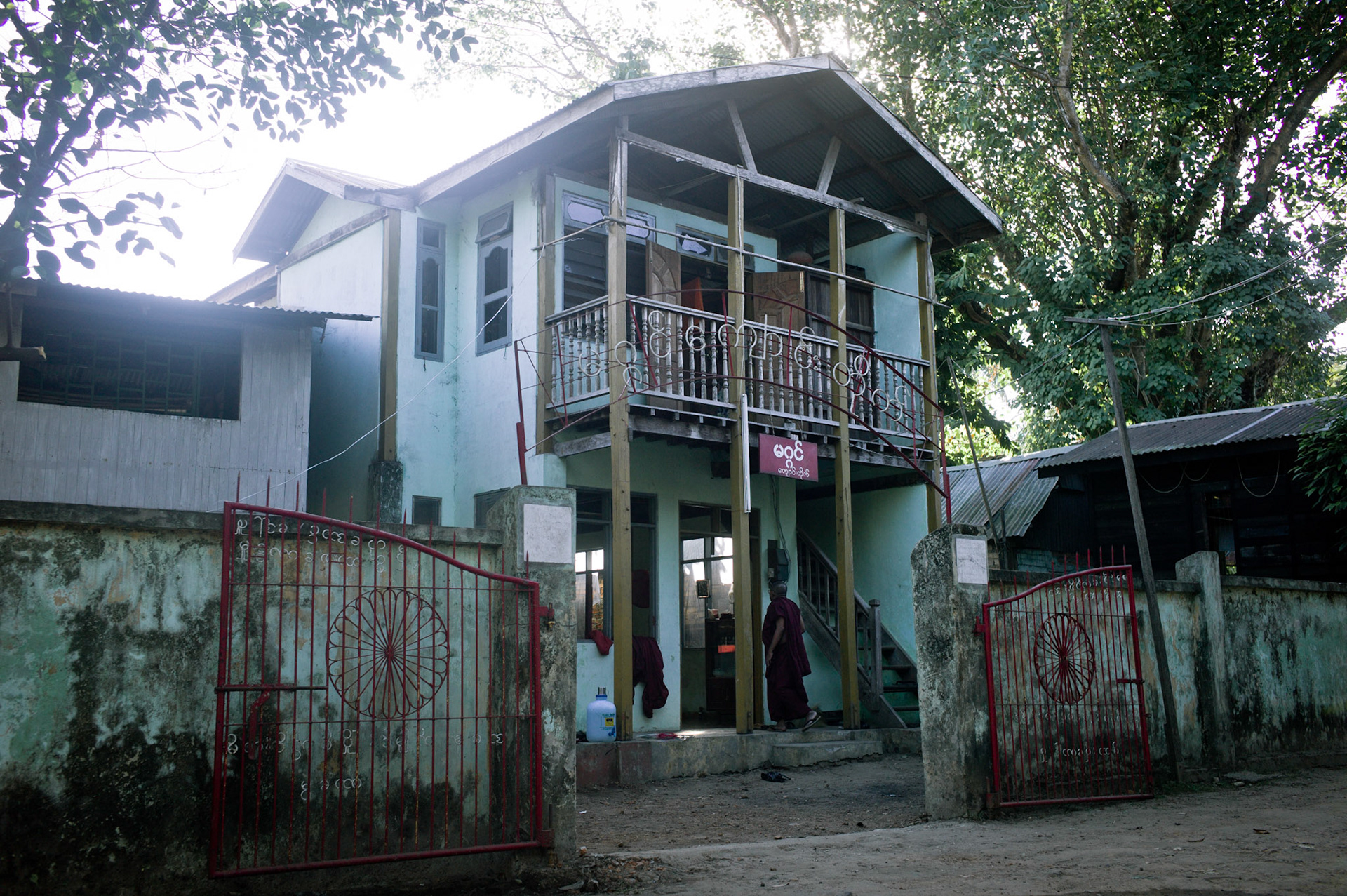 On September 26th 2007, at the height of Burma's monk led Saffron Revolution, Maggin Monastery in Rangoon, was raided as the regime commenced its brutal crackdown on the protests. Soldiers ransacked the monastery, destroying buildings, religious artefacts, books and arrested the monks by force. It was locked shut by the authorities. On 13th January 2012 U Eindaka and his fellow monks were released from prison under a presidential amnesty and more than four years since Maggin monastery was raided and locked, they returned to their home and opened the doors once more. Everything they found was exactly as it was left the night the military regime arrested them and ransacked the buildings.