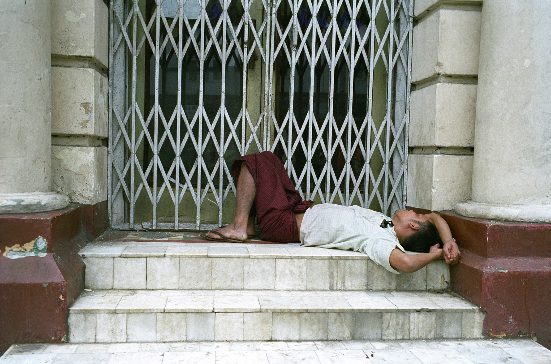 Rangoon (Yangon) former capital city of Burma (Myanmar). With a population of over four million, continues to be the country's largest city and the most important commercial center. It has more colonial buildings that anywhere else in South East Asia.