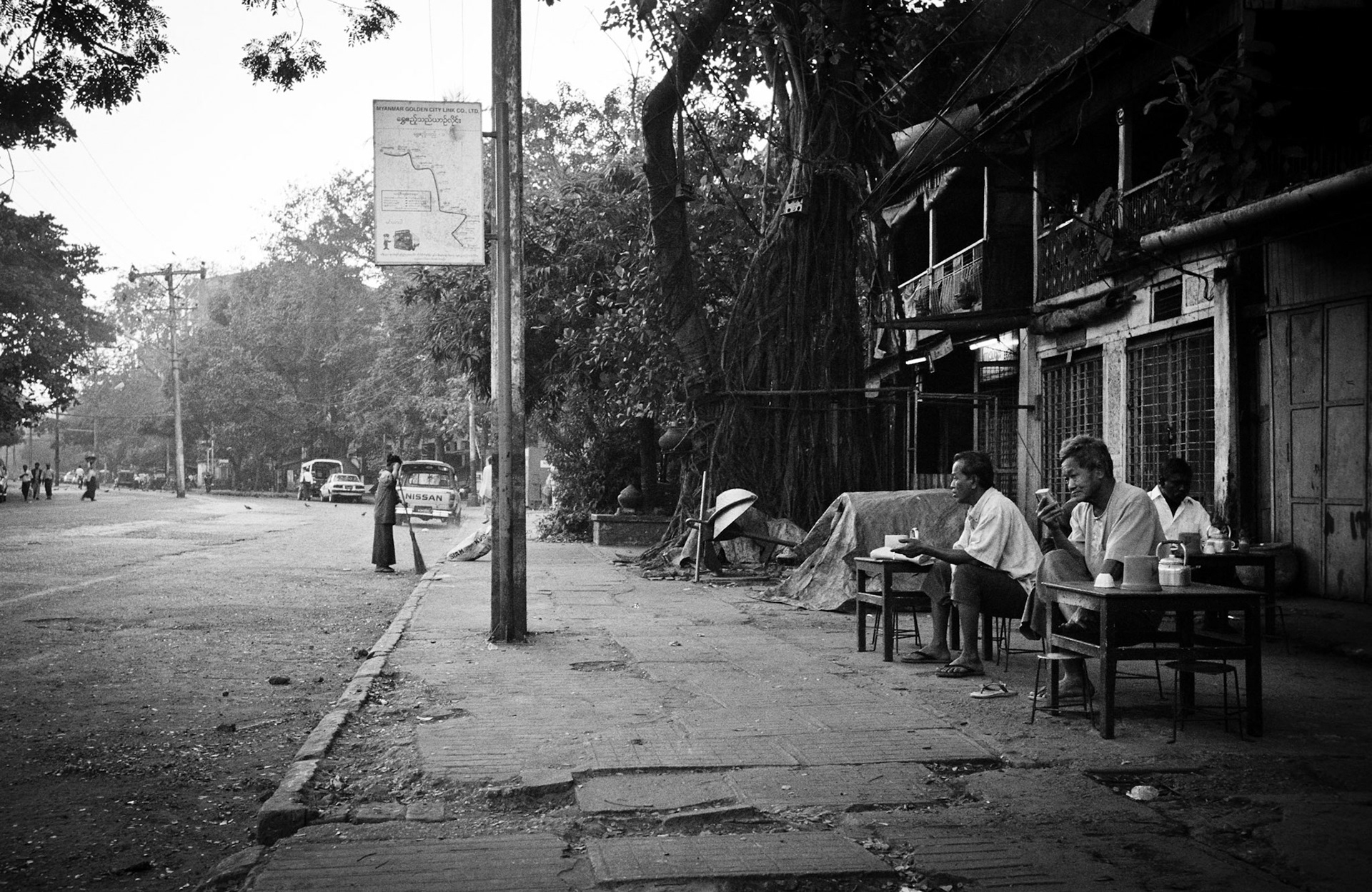 Daily life on the streets of Rangoon where vendors offer everything for sale from fresh food to bric-brac and discarded items. Burma, a resource rich nation, has become one of the poorest in the world with estimated more than 30% of the population living on or below the poverty line and where the ruling military regime spend less than 2% of GDP on education and healthcare combined.