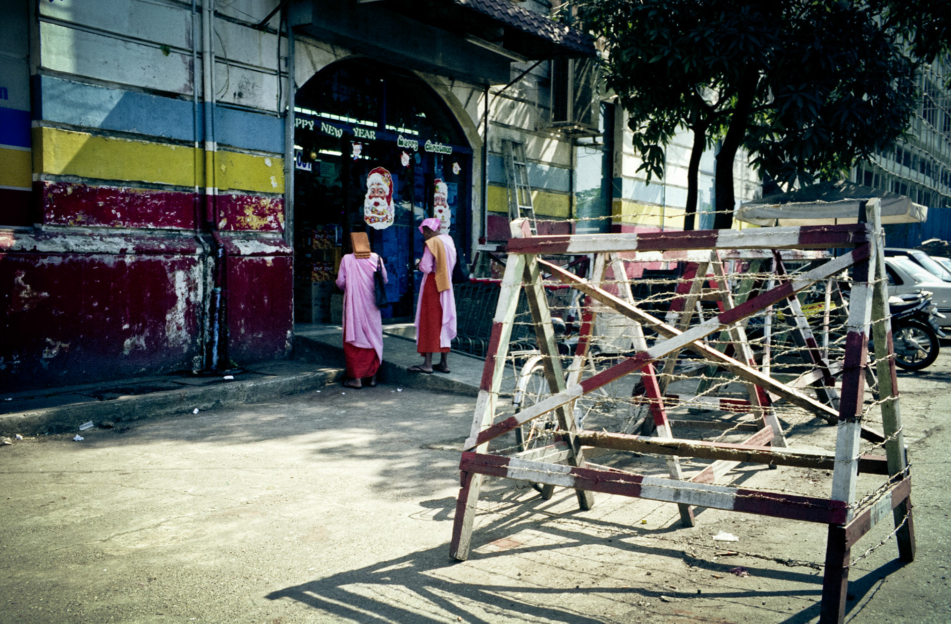 Nuns collecting their morning alms in downtown Rangoon
