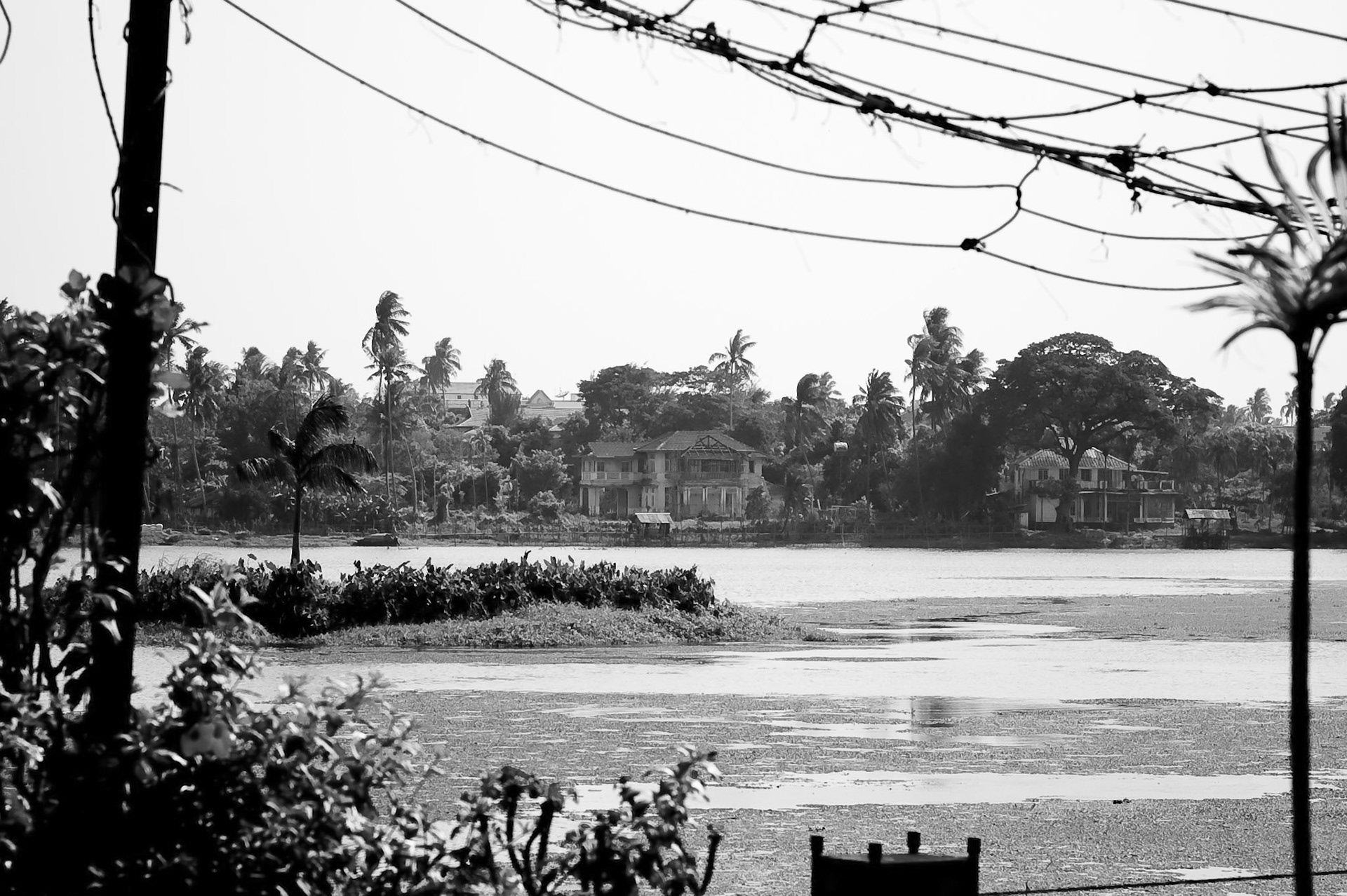 Across Inya Lake lies 54 University Avenue in Rangoon Burma where democracy icon Aung San Suu Kyi has been kept under house arrest at her home for more than 15 years