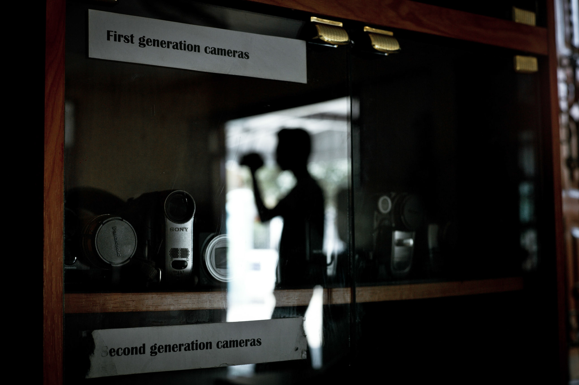 Training of VJs recently arrived from inside Burma takes place in the secret headquarters. The latest technology and skills are required by all undercover reporters inside Burma. Old cameras used by VJs in the film 'Burma VJ' are on display to remind everyone of both the dangers involved but the success that can be gained