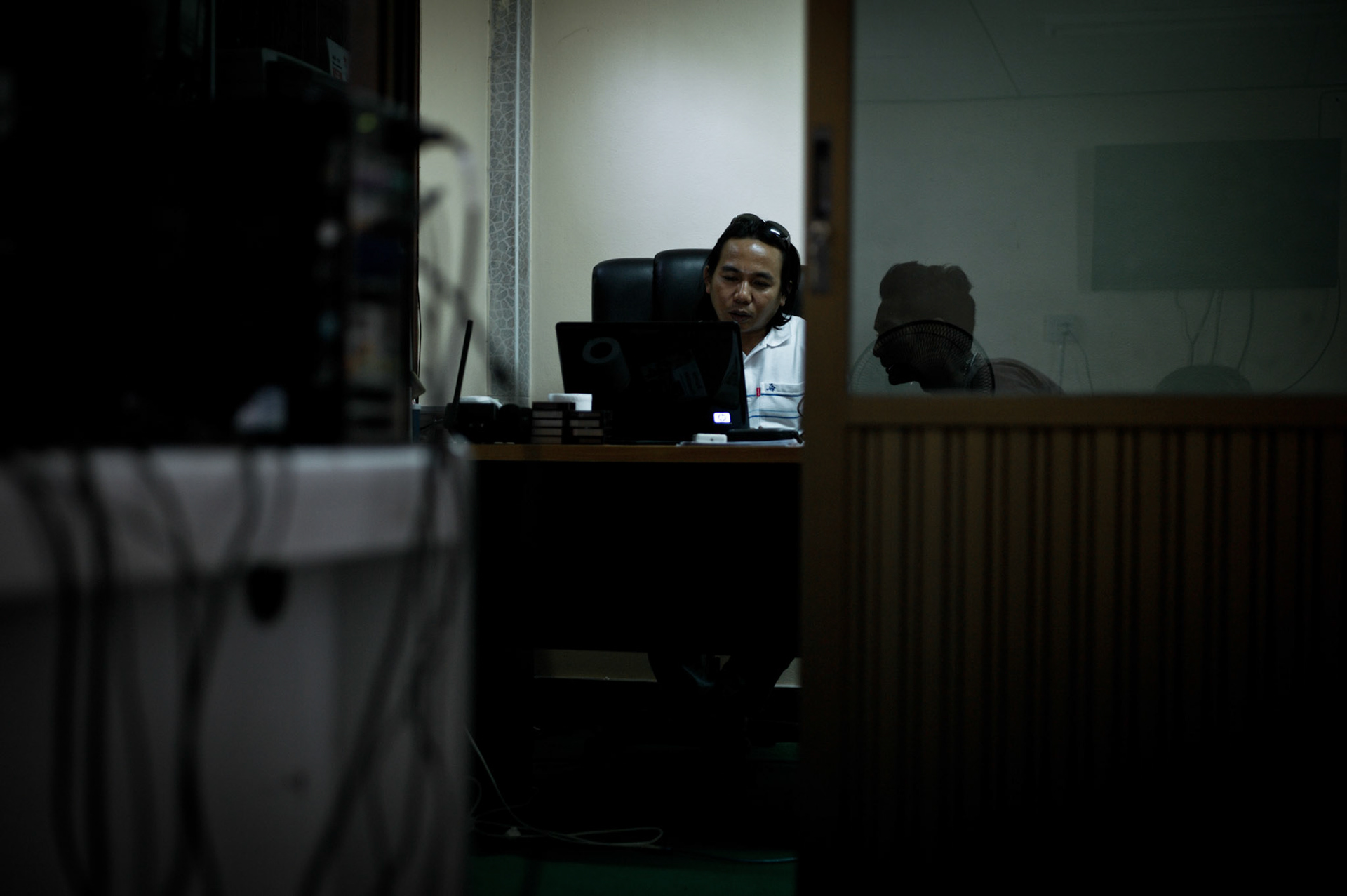 Myo Min Naing, a former political prisoner who spent 11 years behind bars for his political activities, is in charge of the DVB VJ network. With over 100 teams working inside Burma 24 hours a day, the VJs running the secret headquarters work all around the clock non stop to edit and broadcast the latest news from inside