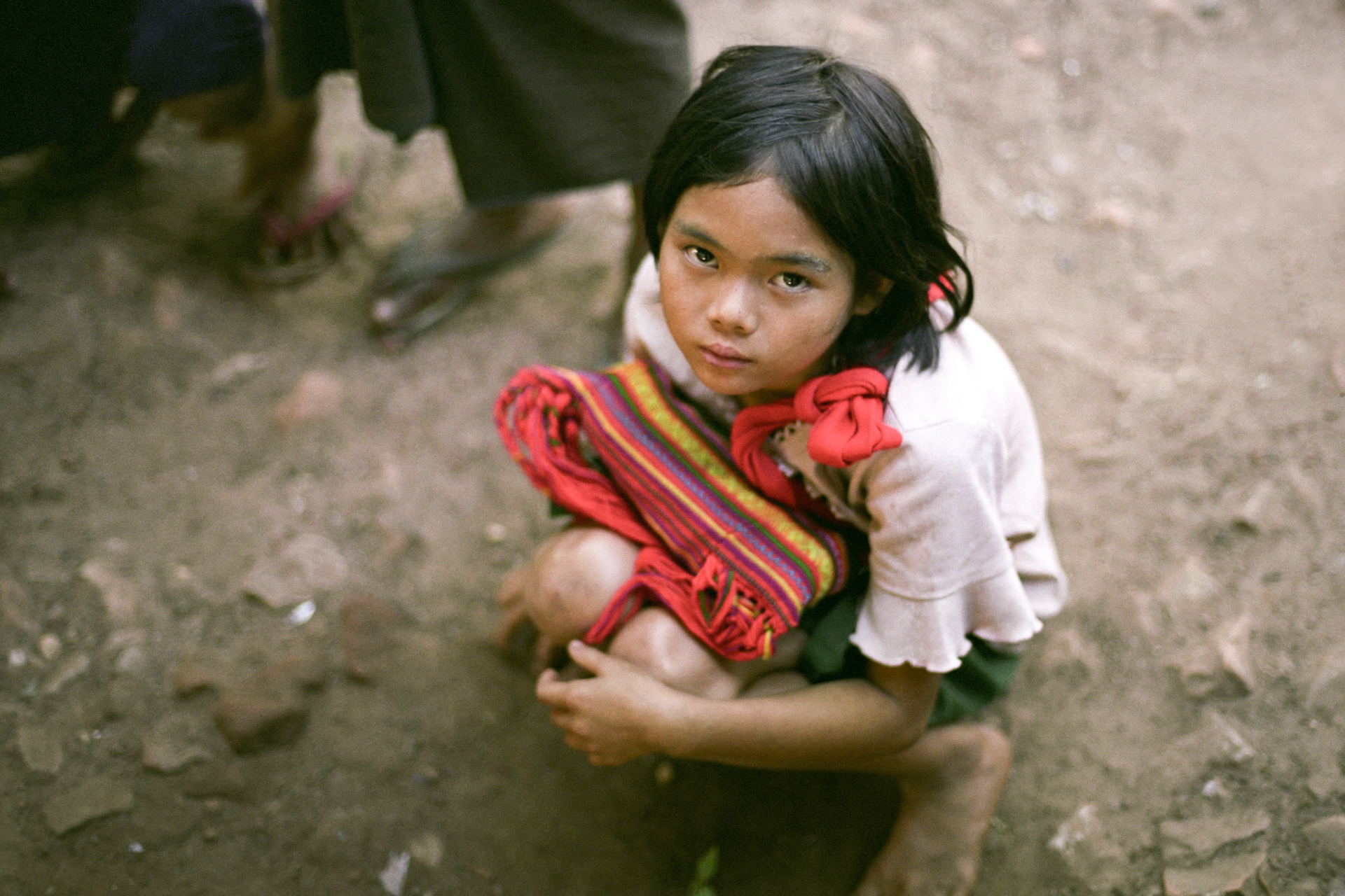A homeless young girl, like so many poor young children in Burma, now lives in a monastery in Rangoon where she can receive education and hope for her future that the government can not provide