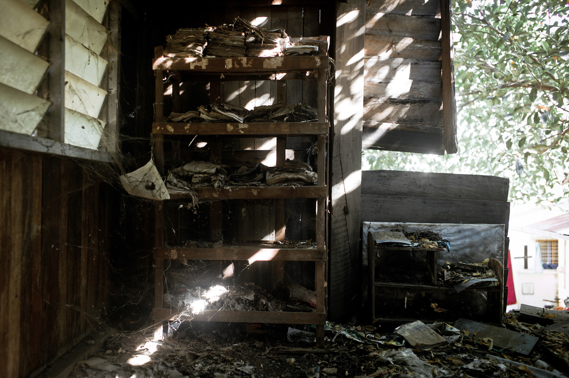 Nothing was spared from the soldiers as they tore through the monasteries buildings destroying everything in their path. On September 26th 2007, at the height of Burma's monk led Saffron Revolution, Maggin Monastery in Rangoon, was raided as the regime commenced its brutal crackdown on the protests. On 13th January 2012 the monks were released from prison and more than four years since the monastery was raided and locked, they returned and opened the doors once more. Everything they found was exactly as it was left the night the military regime arrested them and ransacked the buildings.