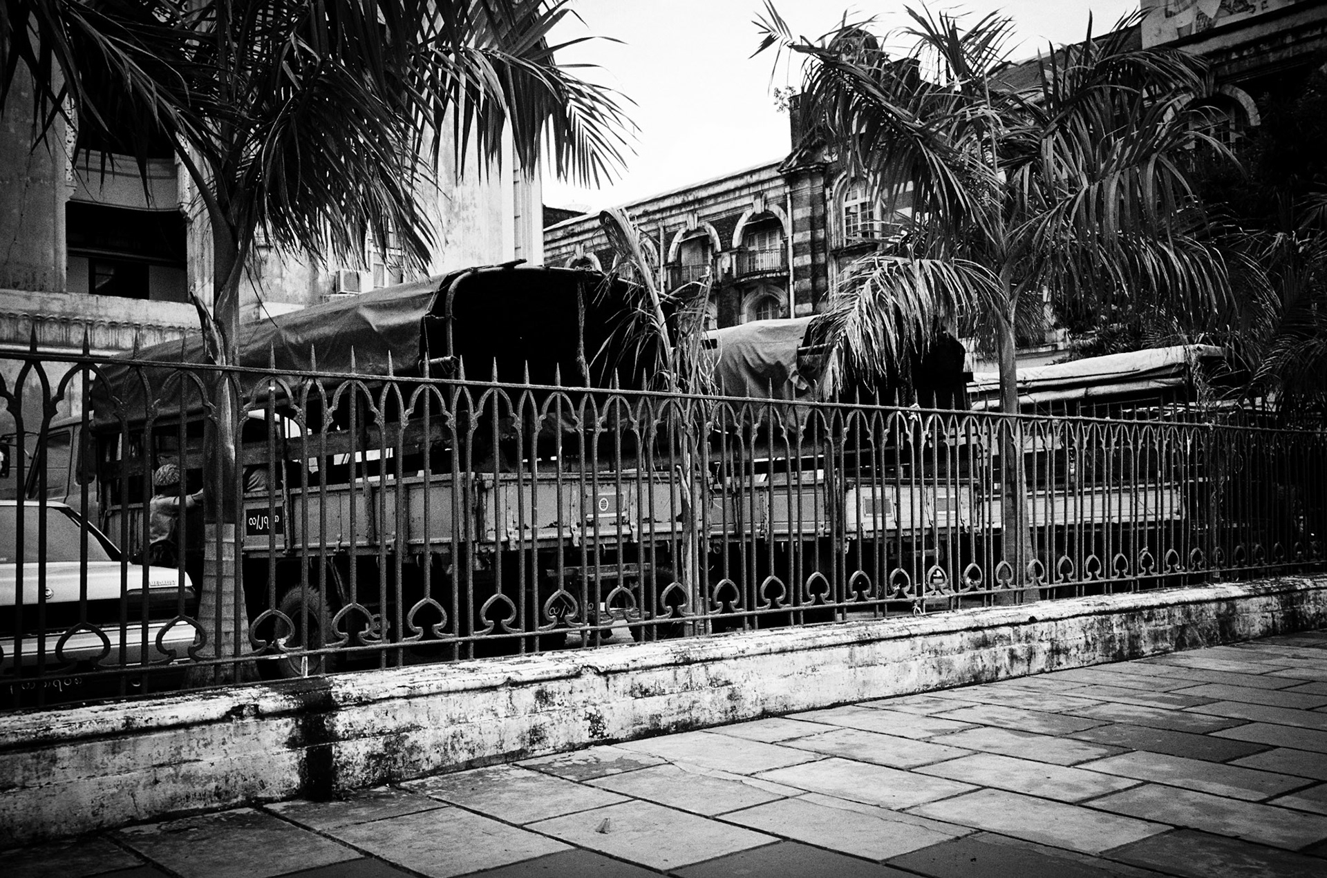 Police trucks lined up outside city Hall in Rangoon. The authorities keep a strict control on public life in Burma, tolerating no form of opposition or dissent