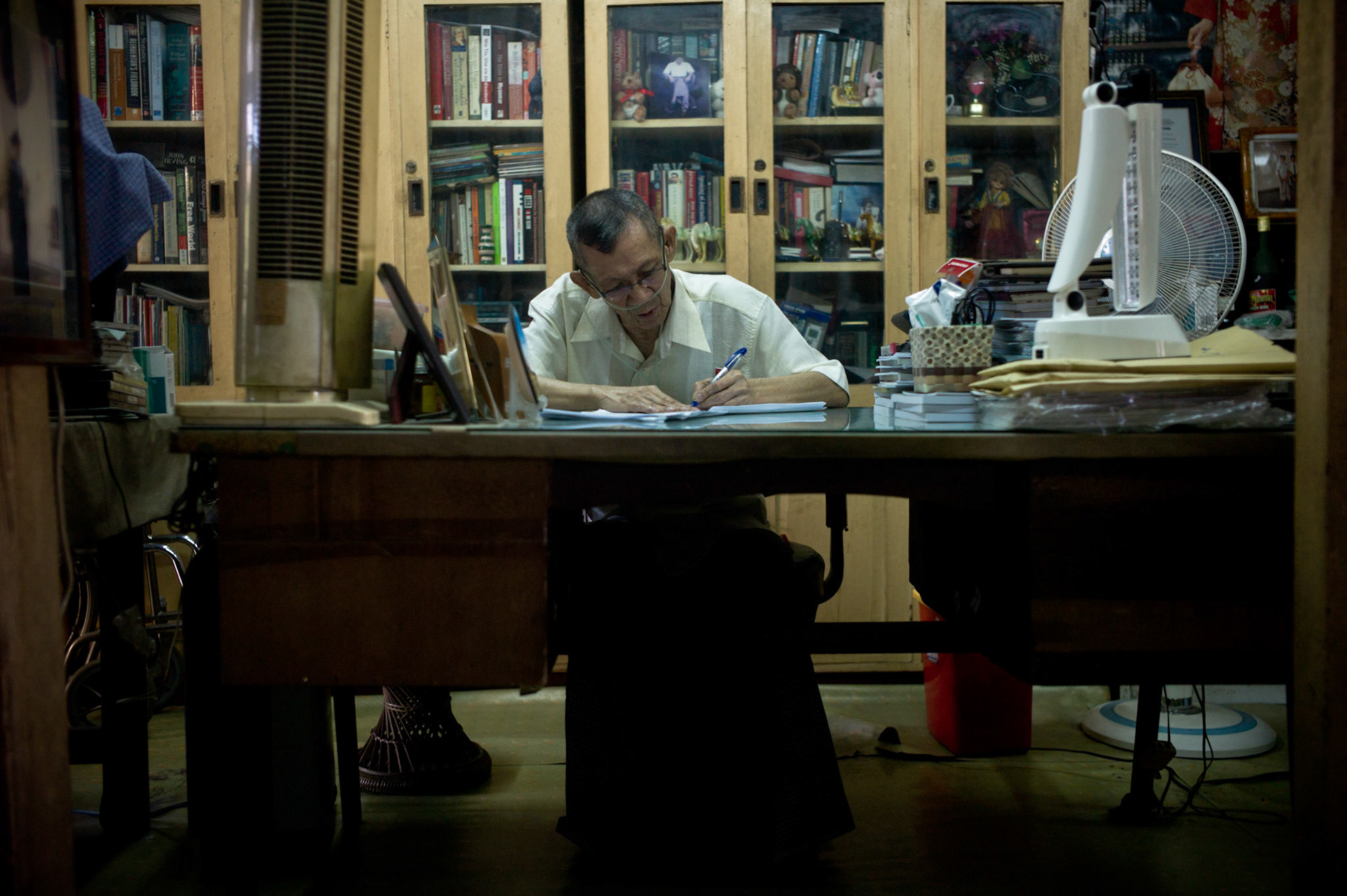 Ludu U Sein Win, one of Burma's most famous and respected journalists is also one of the most outspoken critics of the ruling regime. For decades his articles and writings have openly defied the authorities strict censorship rules  but his condemnation has has had its price to pay. In 1967 he was sentenced without trial to 13 years in prison for his political writings, being jailed in Insein prison and Coco Island. He was released in 1976 but was re-arrested almost immediately and jailed for a further 4 years. He suffered a stroke in prison and despite being paralysed in his right side and in need of oxygen to aid his breathing he continues to defy the regime in writing two articles every day under a guise of different pseudonyms.