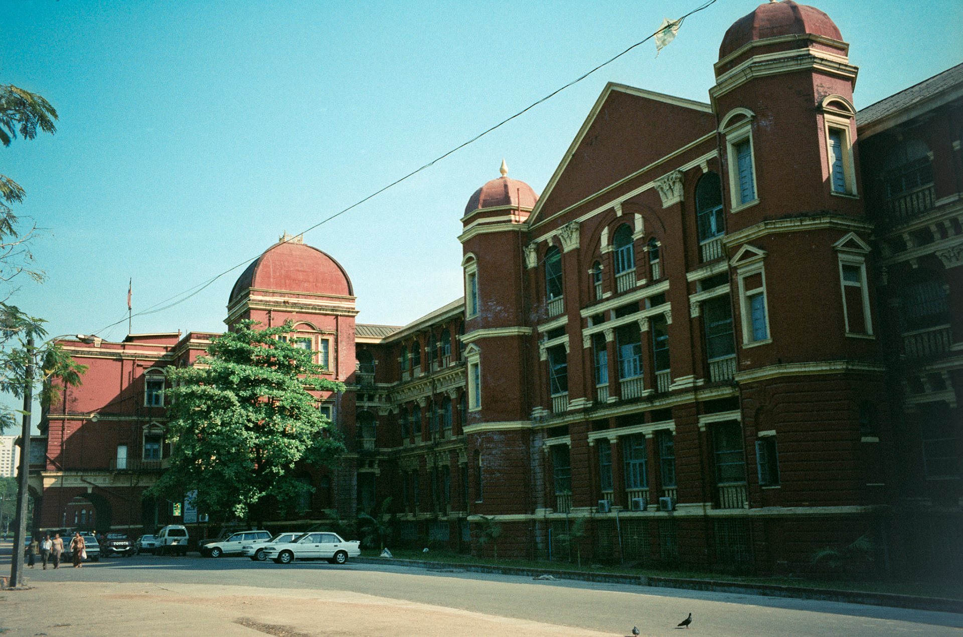 Rangoon General Hospital is a mjaor public hospital in Rangoon (Yangon) former capital city of Burma (Myanmar). Like all civilian hospitals in Burma, it lacks even basic healthcre facilities and the military regime spends approximately just 1% of GDP on healthcare. The building was a major massacre site during the 8888 Uprising, in which injured patients, assumed to have taken part in the anti-government protests, were killed by the Tatmadaw. It is closed to tourists.