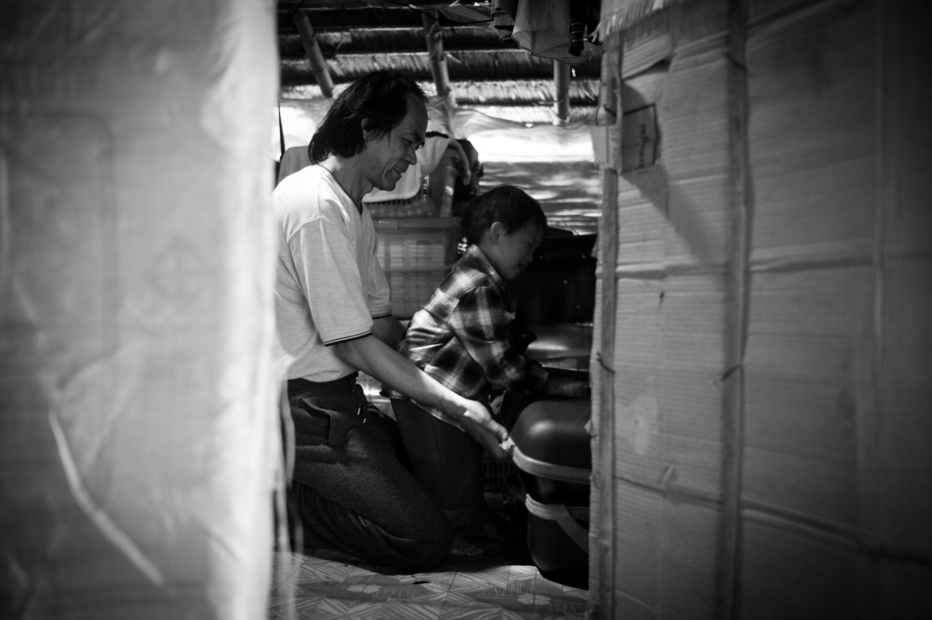 Khun Saing, a former medical student was jailed on three seperate occasions for his political activities spending more than 13 years in prison. He eventually fled Burma after his release in 2004 and met and married his wife Aye Aye Moe (also a former political prisoner) whilst living in Umpiem Mai refugee camp on the Thai-Burma border. Whilst Khun Saing has been resettled to the UK, his wife and young child remain in the camp, unrecognised as refugees and unable to be resettled with him. Now living in the UK, Khun Saing continues his lifelong fight to bring democracy to his country and now his own personal fight to get his family to join him.