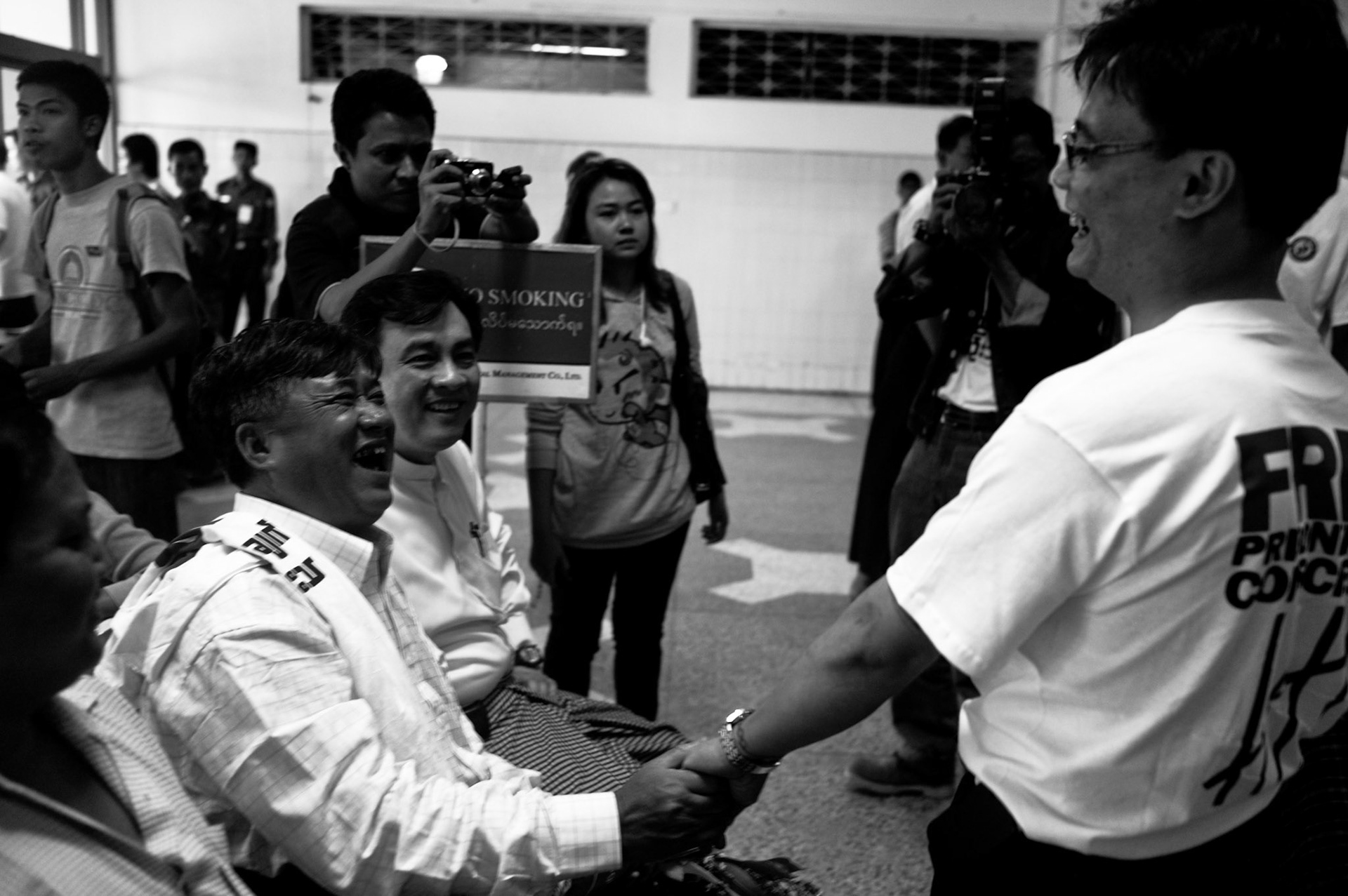 Min Zeya shares a joke with Zayar Thaw, the leader of Generation Wave and now security assistant to Aung San Suu Kyi, who was released from prison in June 2011. The Presidential amnesty saw more than 600 political prisoners released from prison, many of who were former leaders of the mass democracy uprising in 1988 and were serving long sentences of 65 years or more.