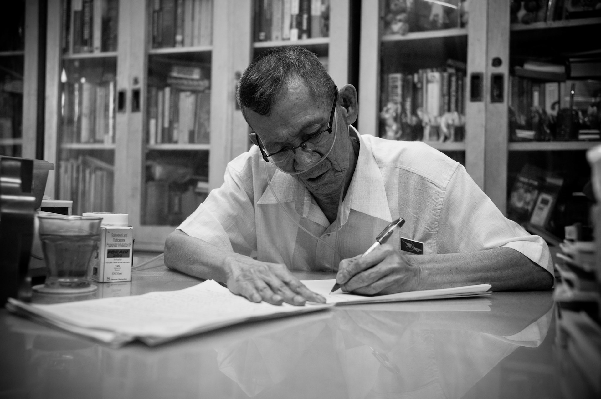 Ludu U Sein Win, one of Burma's most famous and respected journalists is also one of the most outspoken critics of the ruling regime. For decades his articles and writings have openly defied the authorities strict censorship rules  but his condemnation has has had its price to pay. In 1967 he was sentenced without trial to 13 years in prison for his political writings, being jailed in Insein prison and Coco Island. He was released in 1976 but was re-arrested almost immediately and jailed for a further 4 years. He suffered a stroke in prison and despite being paralysed in his right side and in need of oxygen to aid his breathing he continues to defy the regime in writing two articles every day under a guise of different pseudonyms.