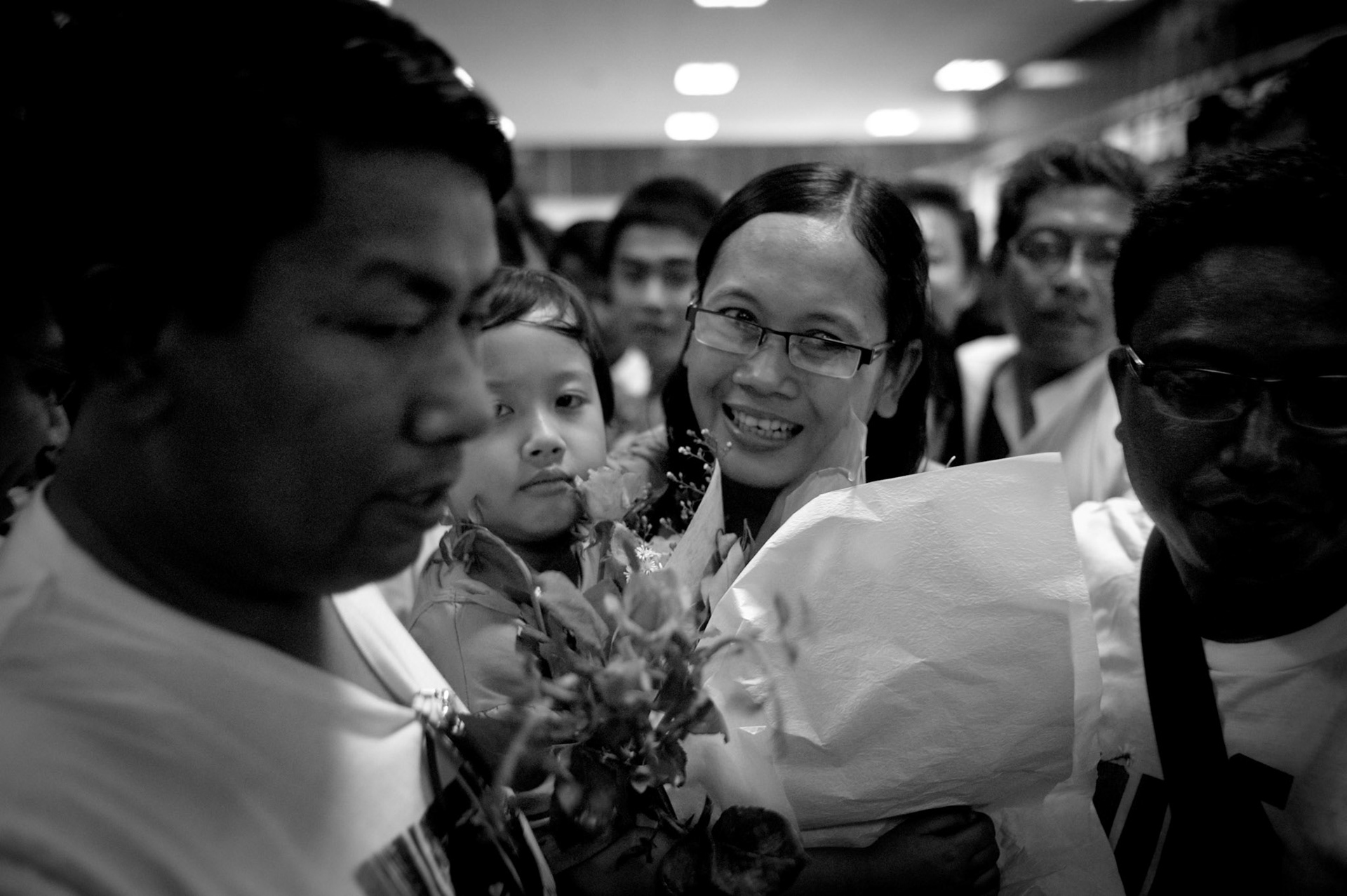 Nilar Thein, released from Tharawaddy prison, is reunited with her 5 year old daughter Phyu Nay Kyi. The Presidential amnesty saw more than 600 political prisoners released from prison, many of who were former leaders of the mass democracy uprising in 1988 and were serving long sentences of 65 years or more.