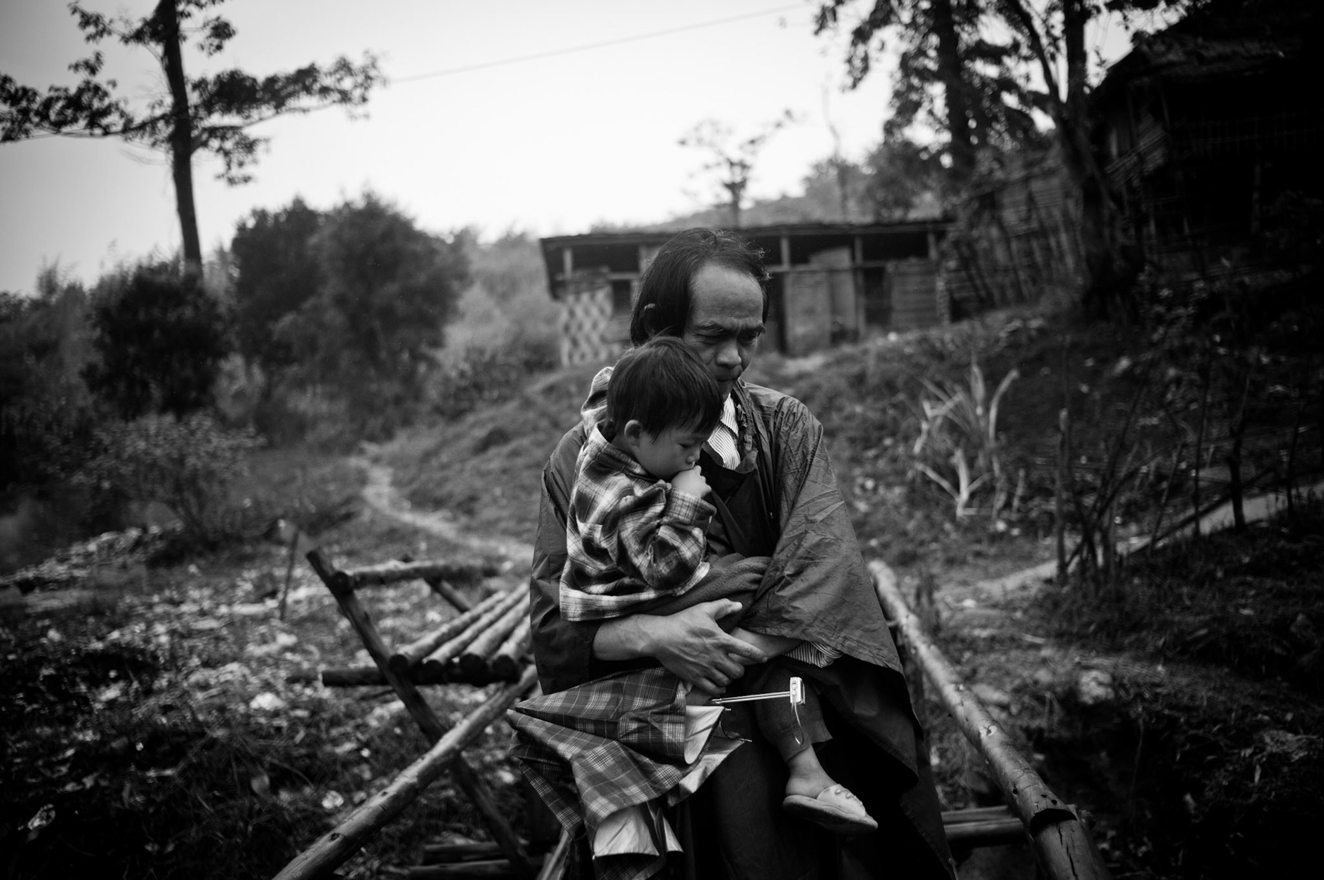 Khun Saing, a former medical student was jailed on three seperate occasions for his political activities spending more than 13 years in prison. He eventually fled Burma after his release in 2004 and met and married his wife Aye Aye Moe (also a former political prisoner) whilst living in Umpiem Mai refugee camp on the Thai-Burma border. Whilst Khun Saing has been resettled to the UK, his wife and young child remain in the camp, unrecognised as refugees and unable to be resettled with him. Now living in the UK, Khun Saing continues his lifelong fight to bring democracy to his country and now his own personal fight to get his family to join him.