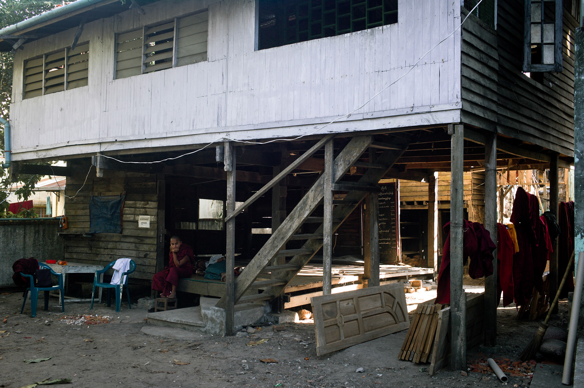 As the monks start to rebuild the monastery new doors have been donated by a local businessman. On September 26th 2007, at the height of Burma's monk led Saffron Revolution, Maggin Monastery in Rangoon, was raided as the regime commenced its brutal crackdown on the protests. On 13th January 2012 the monks were released from prison and more than four years since the monastery was raided and locked, they returned and opened the doors once more. Everything they found was exactly as it was left the night the military regime arrested them and ransacked the buildings.