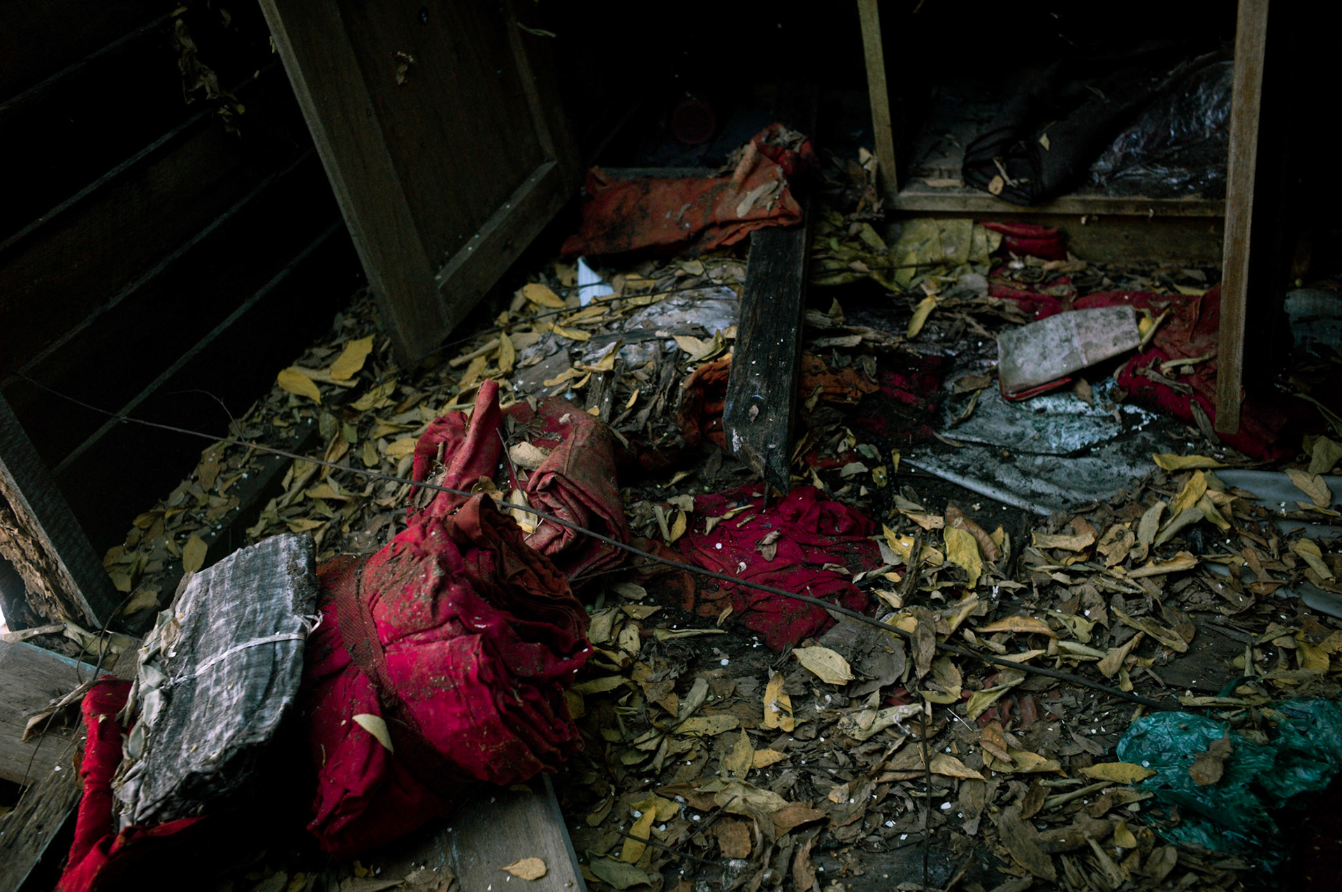 Monks robes emptied from wardrobes and torn from their bodies are left littered on the floor. On September 26th 2007, at the height of Burma's monk led Saffron Revolution, Maggin Monastery in Rangoon, was raided as the regime commenced its brutal crackdown on the protests. On 13th January 2012 the monks were released from prison and more than four years since the monastery was raided and locked, they returned and opened the doors once more. Everything they found was exactly as it was left the night the military regime arrested them and ransacked the buildings.