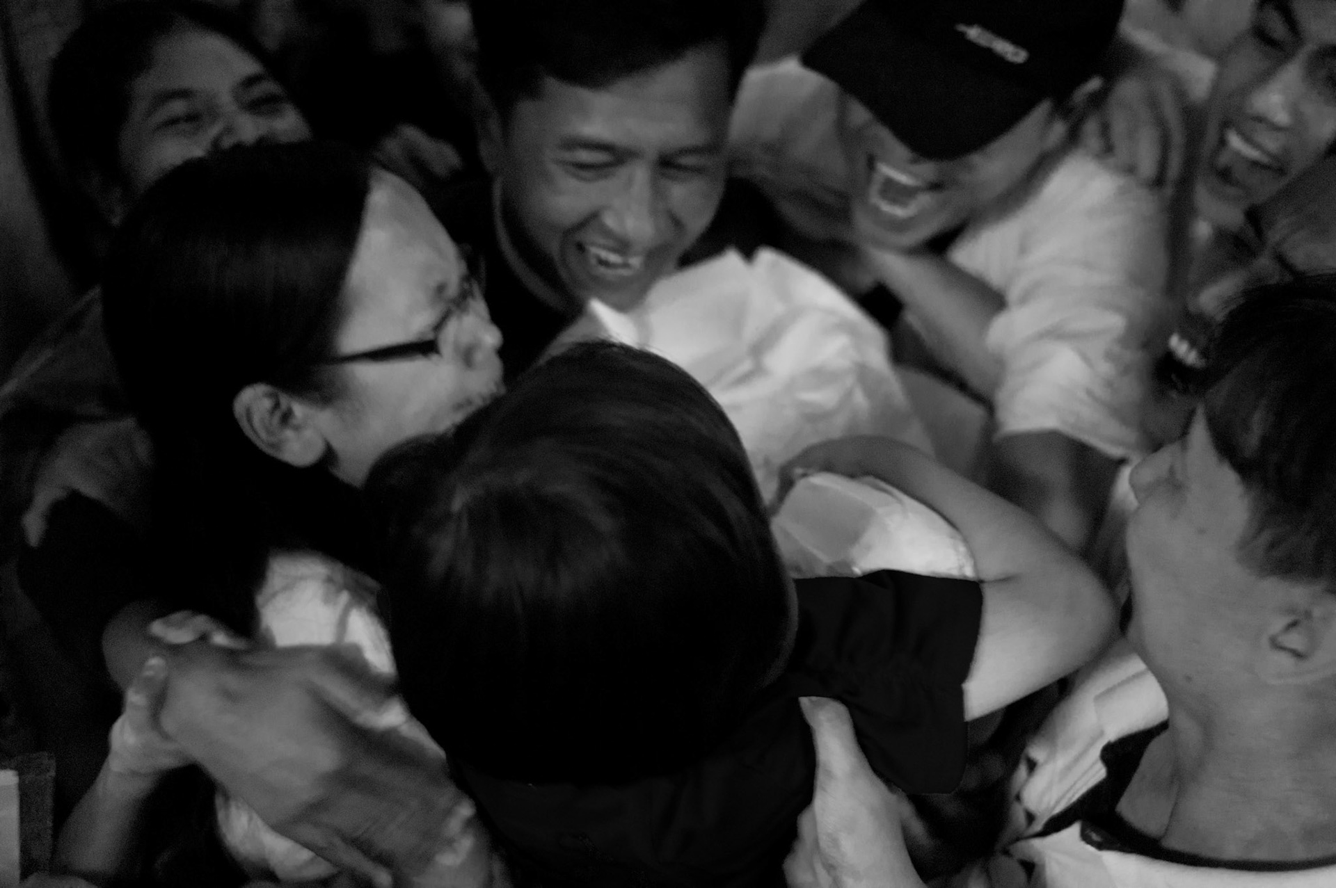 Rangoon airport erupts with emotion as Nilar Thein, Ko Jimmy and their five year old daughter are reunited. The Presidential amnesty saw more than 600 political prisoners released from prison, many of who were former leaders of the mass democracy uprising in 1988 and were serving long sentences of 65 years or more.