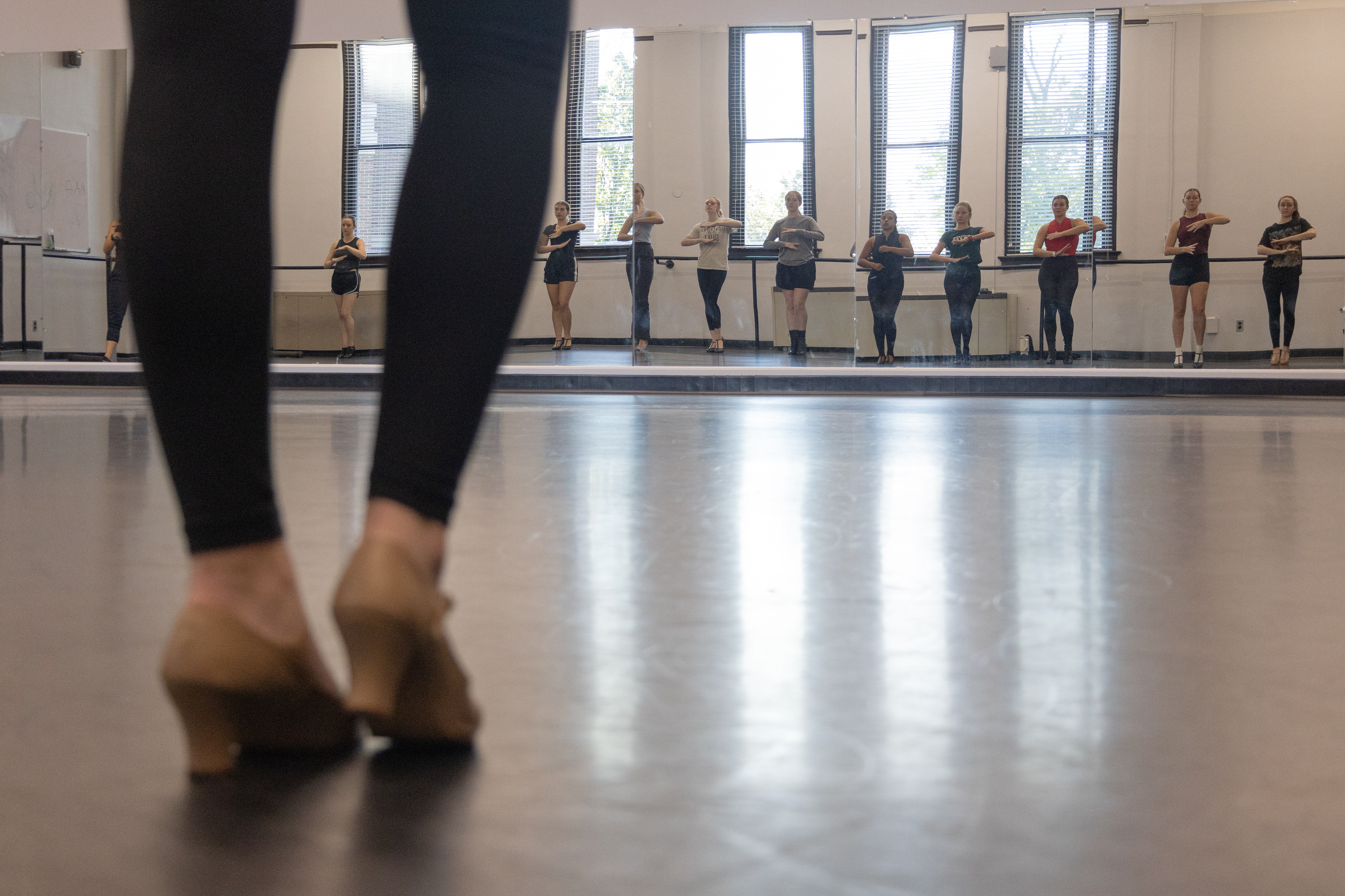 Leslie Glasser faces the mirror during the beginning of rehearsal of “Lady Licorice” in Gordon Wilson Hall on Sept. 18. The WKU Dance Company performed their Candyland themed performance in Van Meter Auditorium Nov. 21-23. 