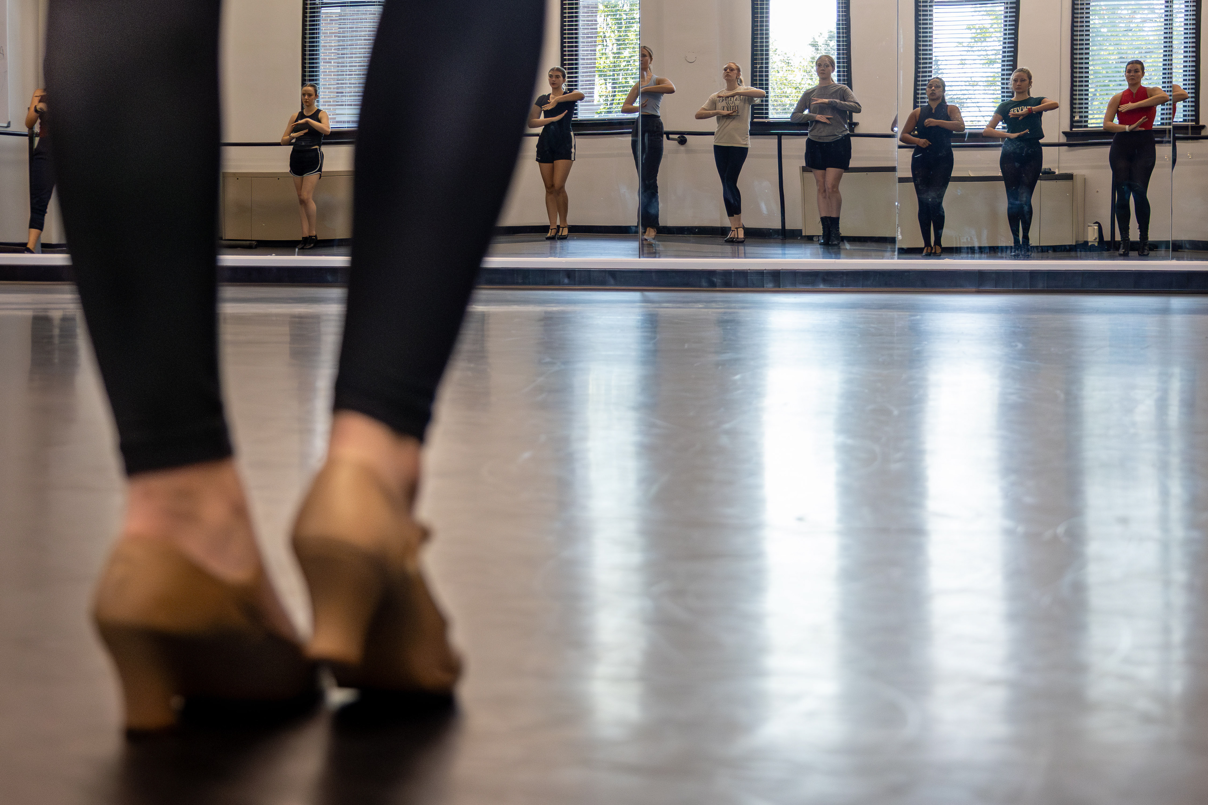 Leslie Glasser faces the mirror during the beginning of rehearsal of “Lady Licorice” in Gordon Wilson Hall on Sept. 18. The WKU Dance Company performed their Candyland themed performance in Van Meter Auditorium Nov. 21-23. 