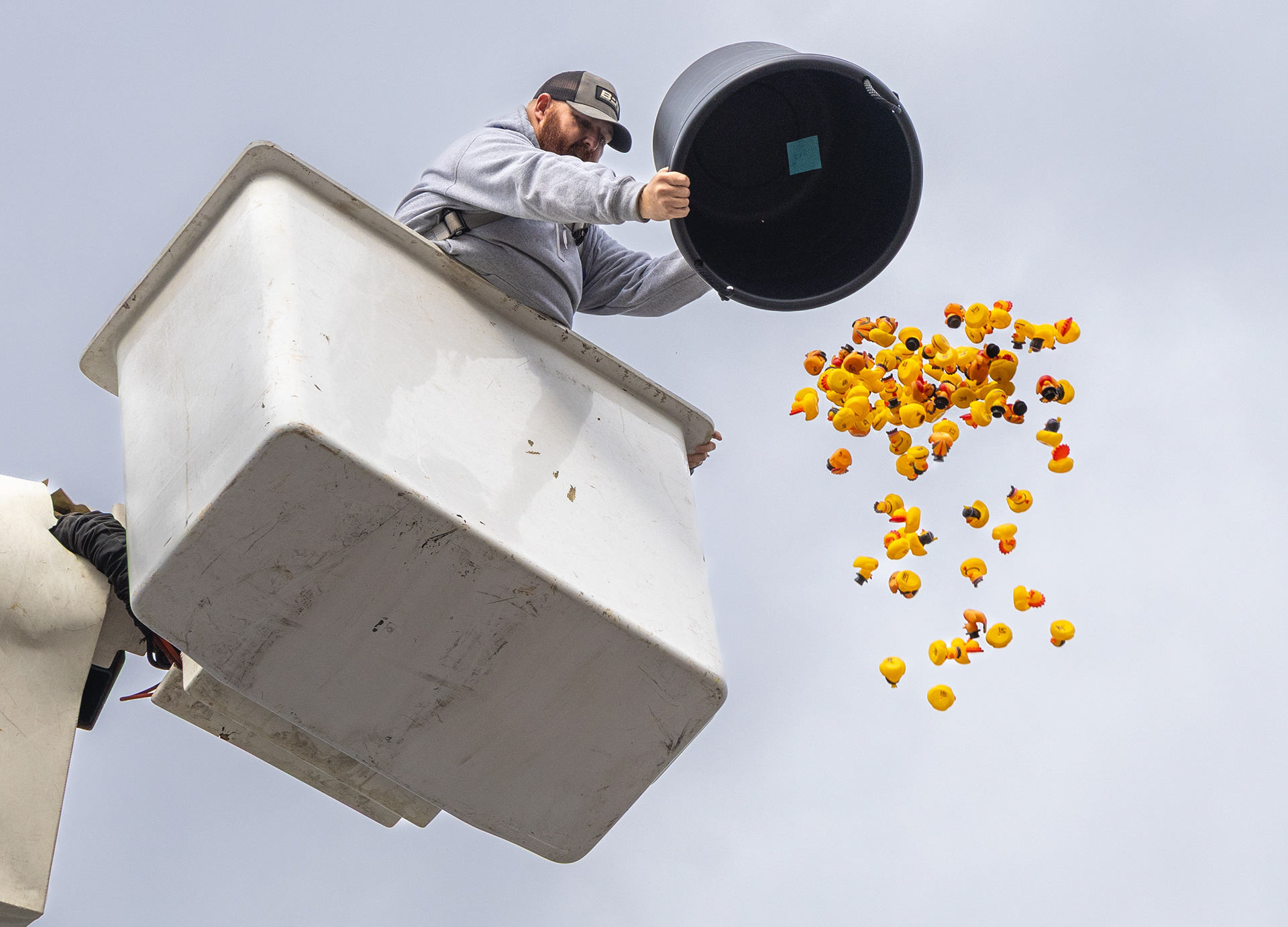 Josh Minton drops 103 rubber ducks during the Second Annual Downtown Duck Drop at the Fringe in Bowling Green on Nov. 24, 2025. The City of Bowling Green Downtown Development Coordinator Tessa Butler said the event raised over $1,000 for “downtown programs and free events.”