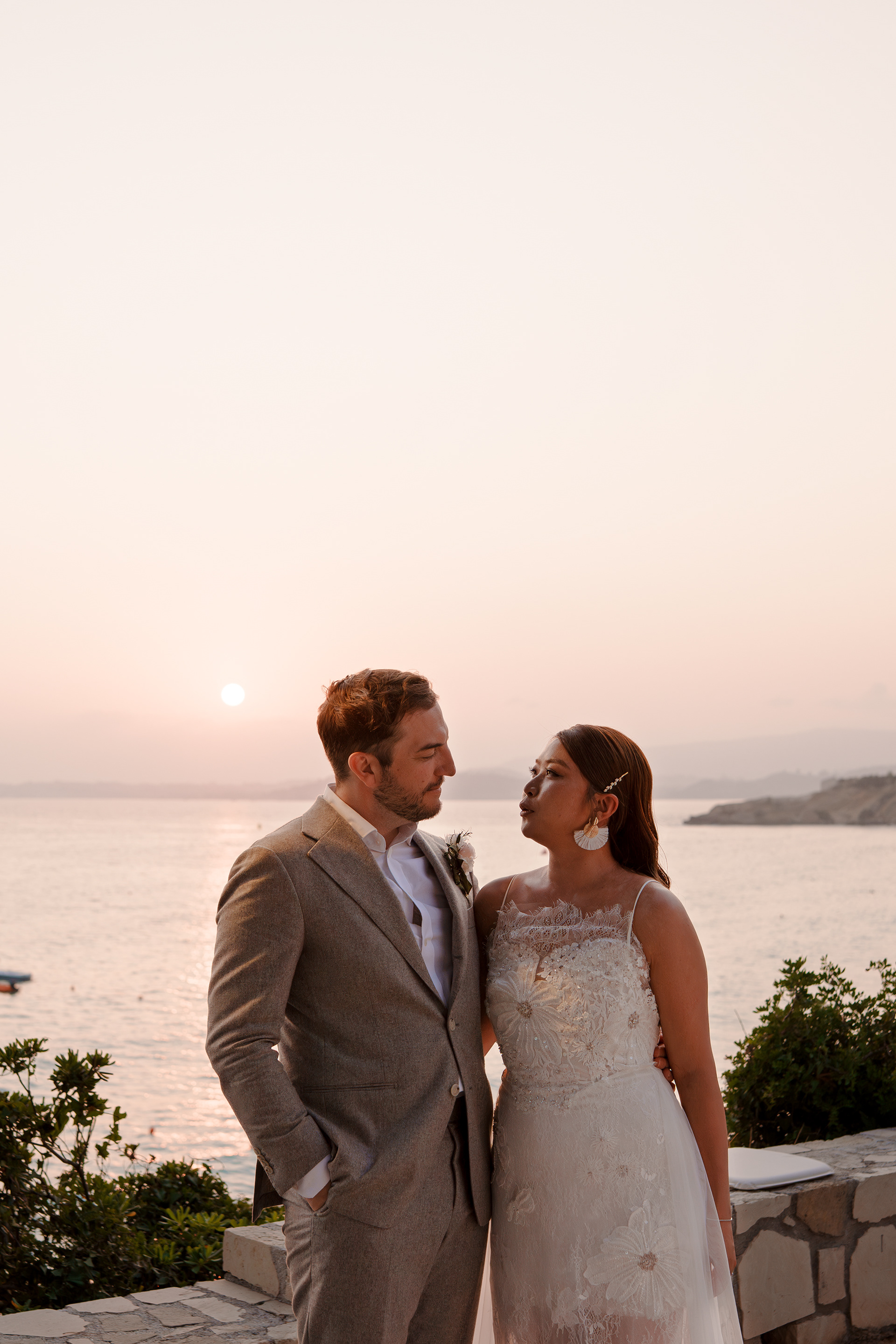 Sunset wedding portraits in White Rocks Hotel in Kefalonia, Greece
