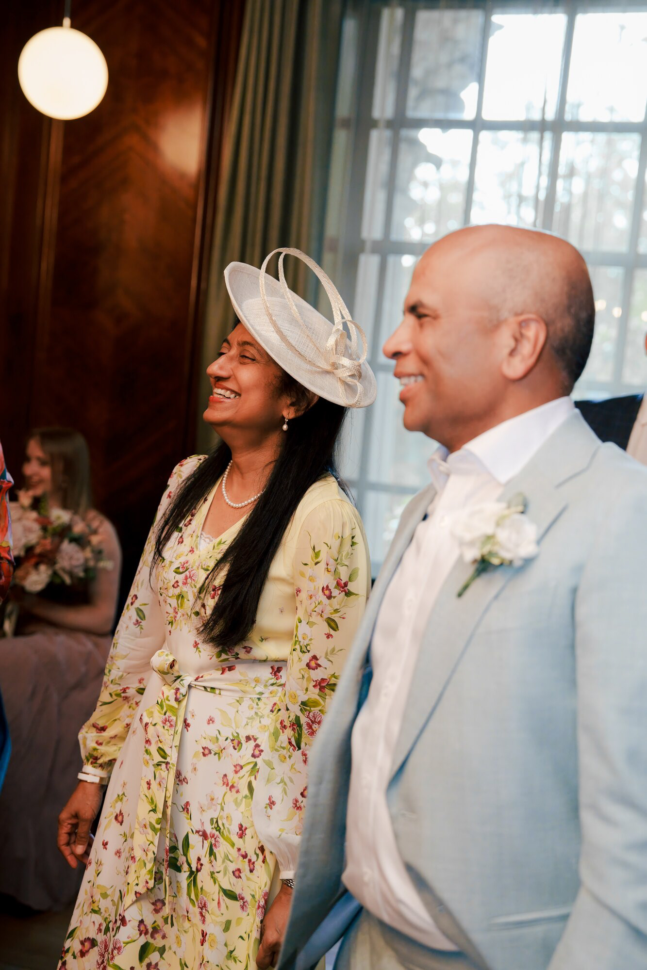 Family smiling at the newlyweds after the ceremony at Old Marylebone Town Hall