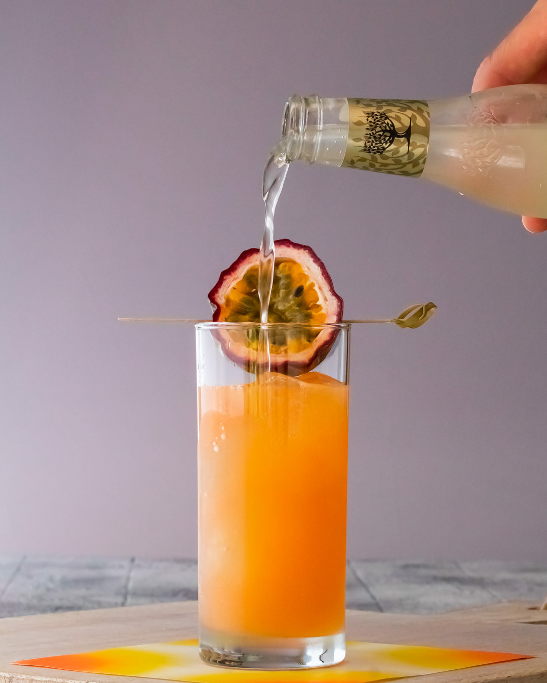 topping passion fruit highball bespoke cocktail with ginger beer
